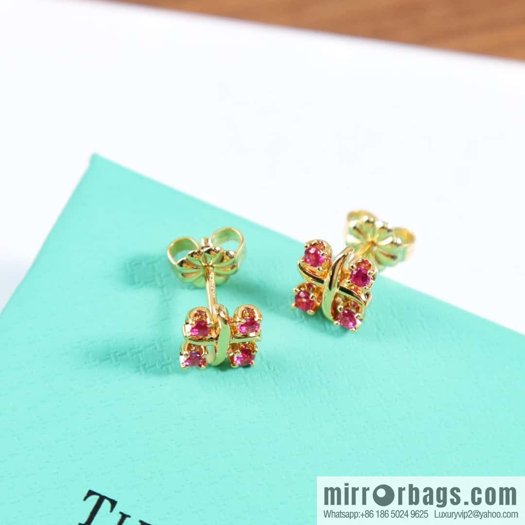 New ☑️ Tiffany & Co. Tiffany color cross stud earrings