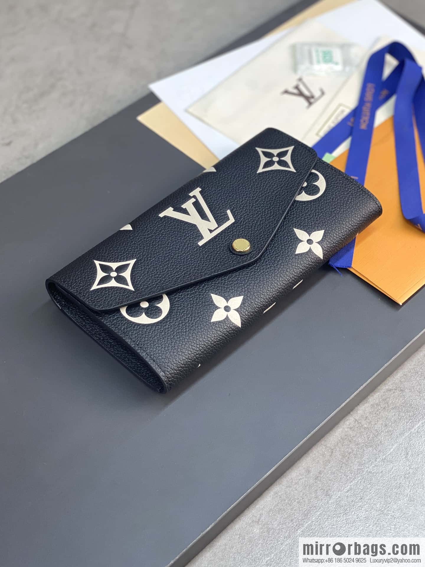 LV M80496 Sarah Wallet