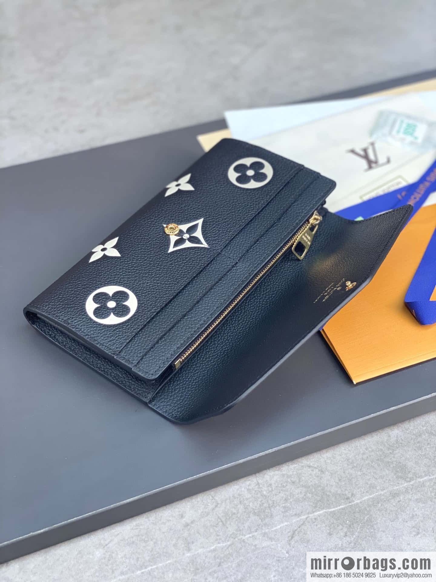 LV M80496 Sarah Wallet
