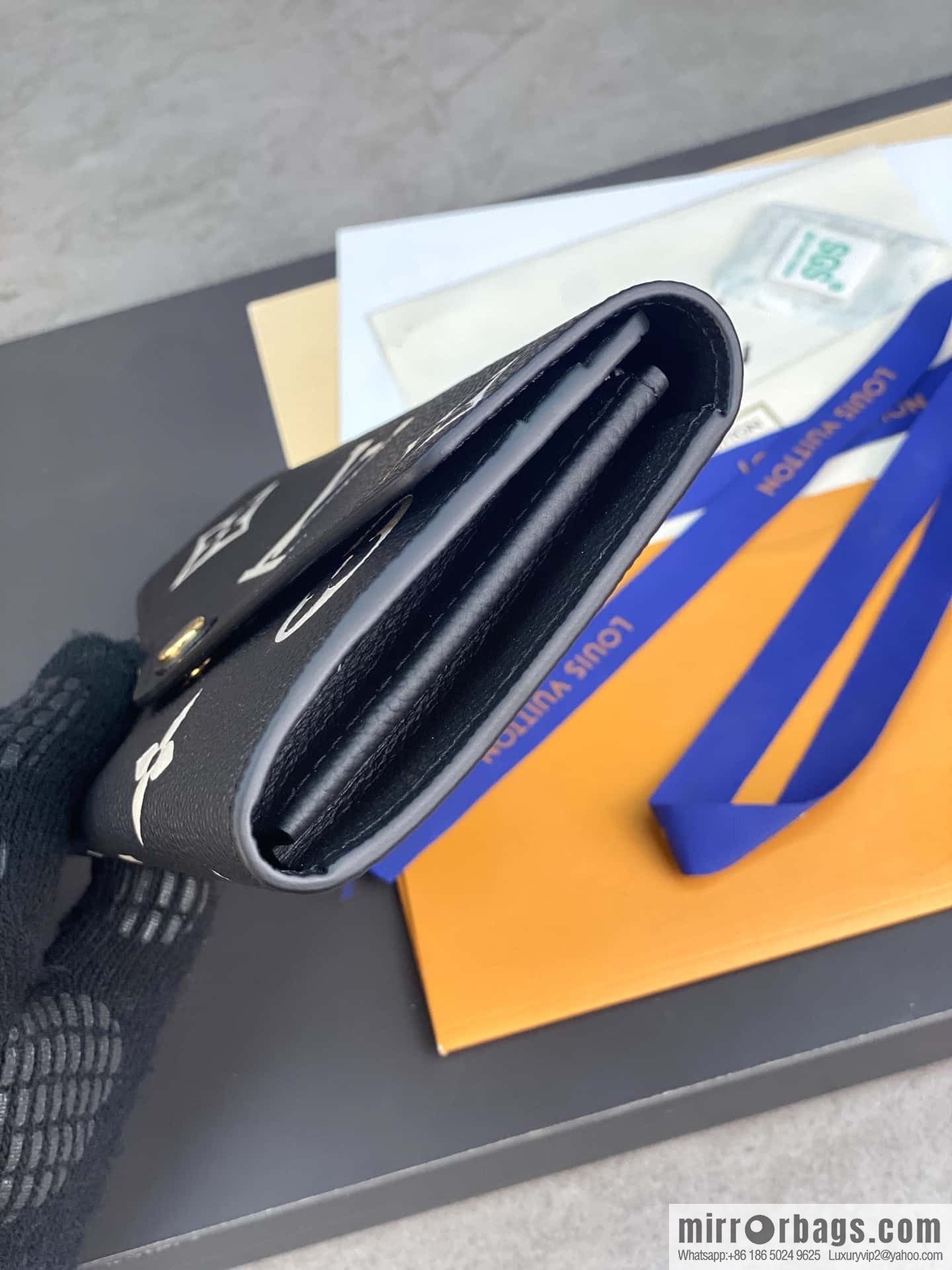 LV M80496 Sarah Wallet