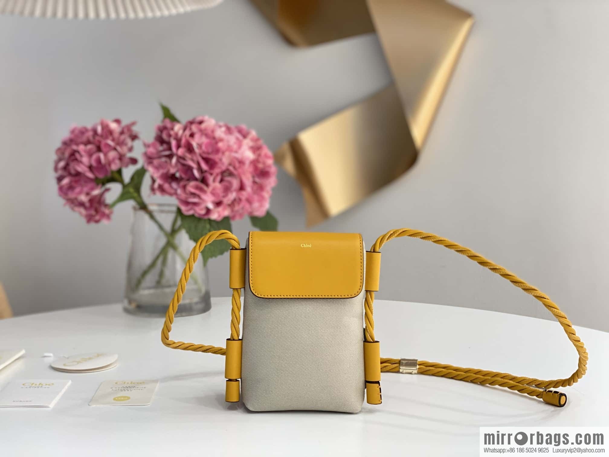 Chloe key X mobile phone bag, yellow cloth.