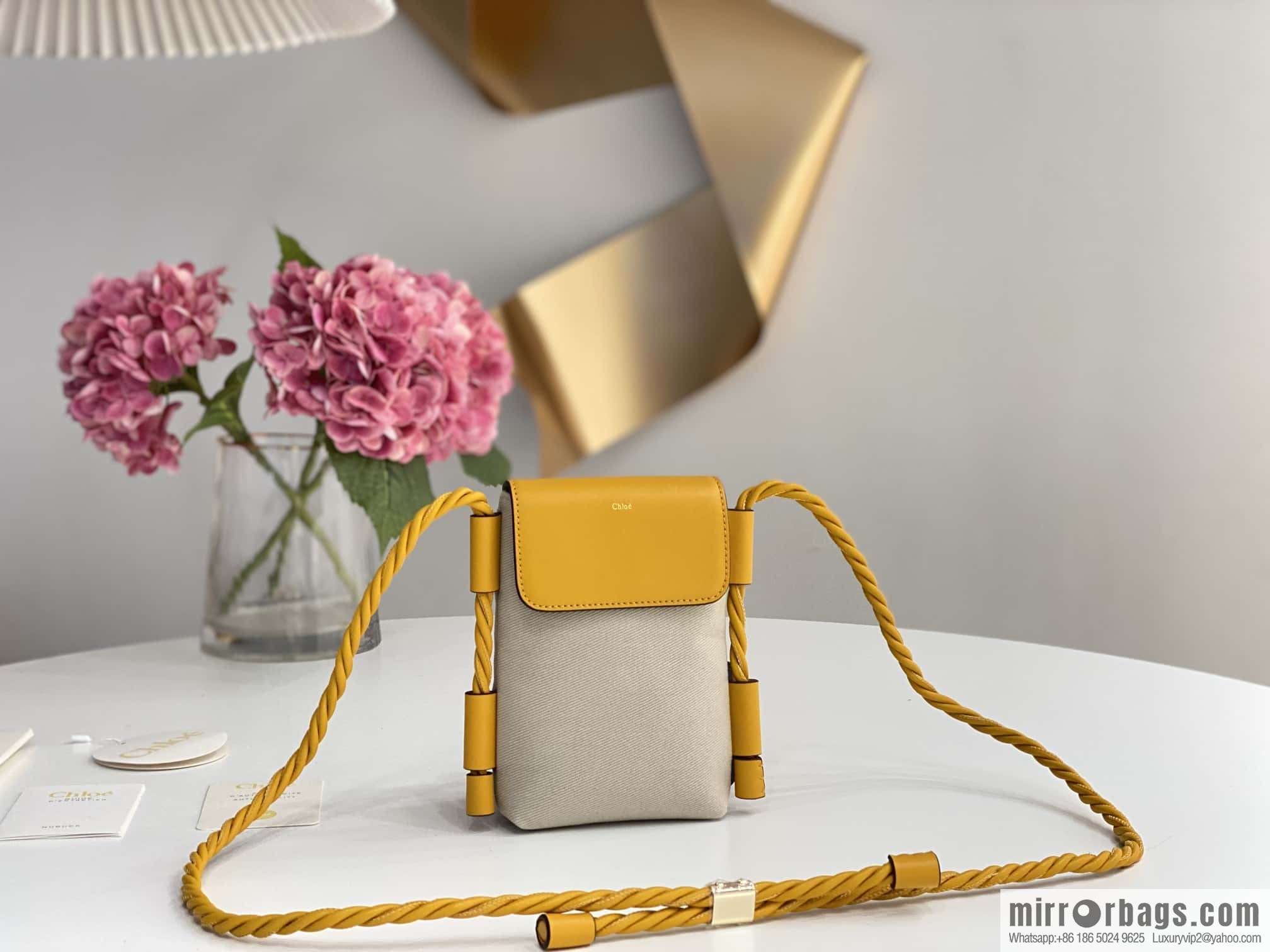 Chloe key X mobile phone bag, yellow cloth.
