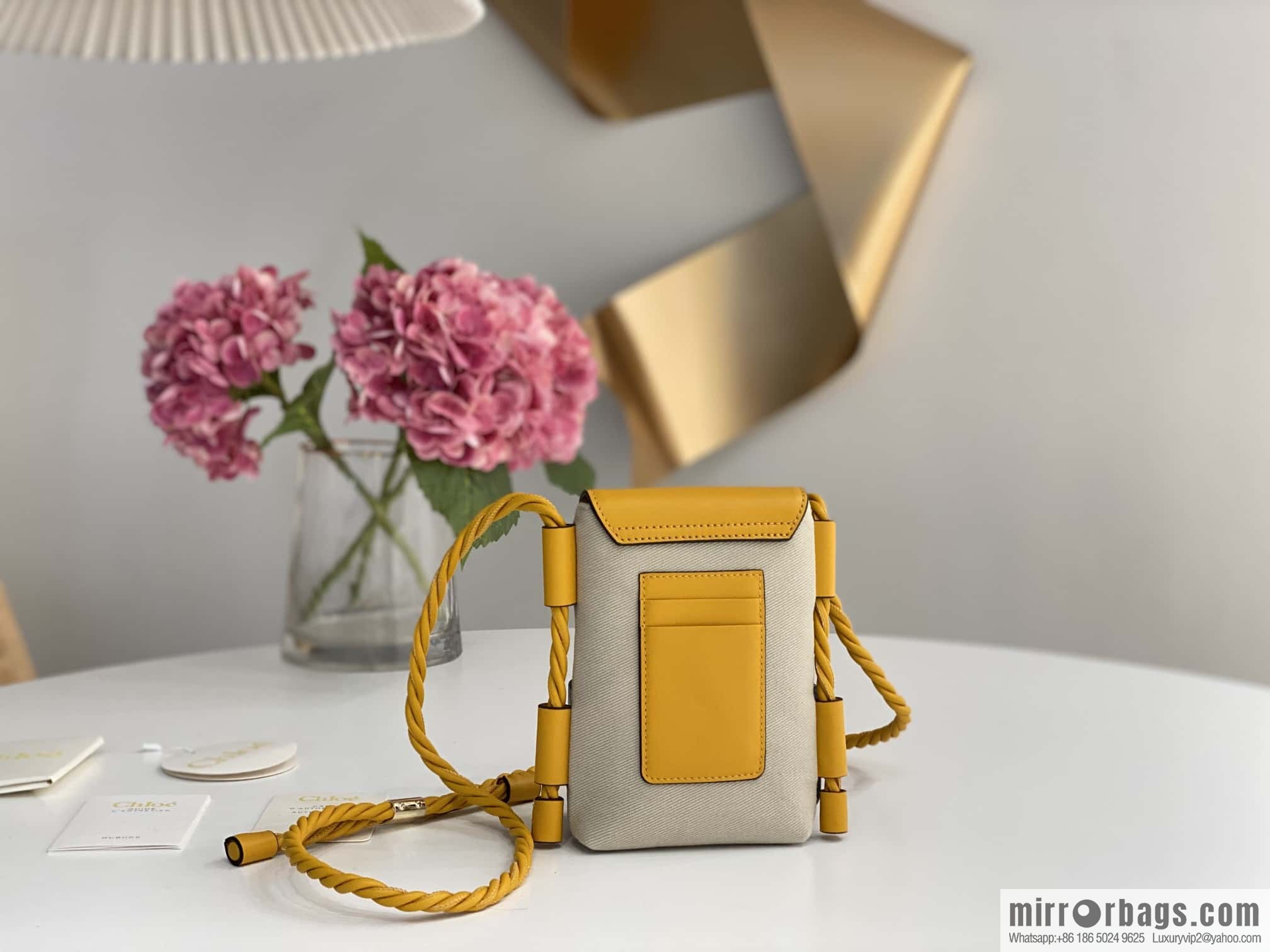 Chloe key X mobile phone bag, yellow cloth.