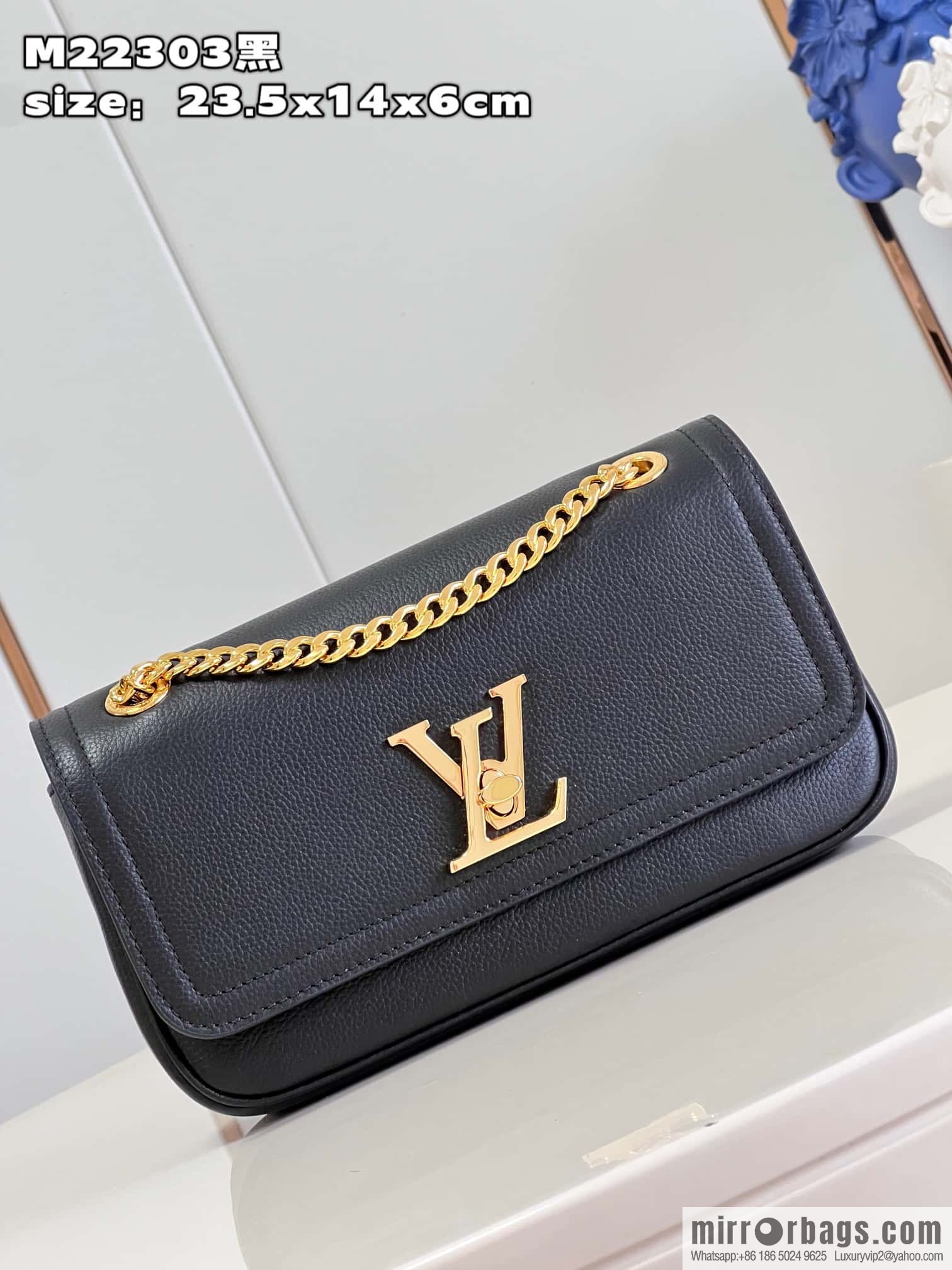 LV M22303 LOCKME EAST WEST chain bag