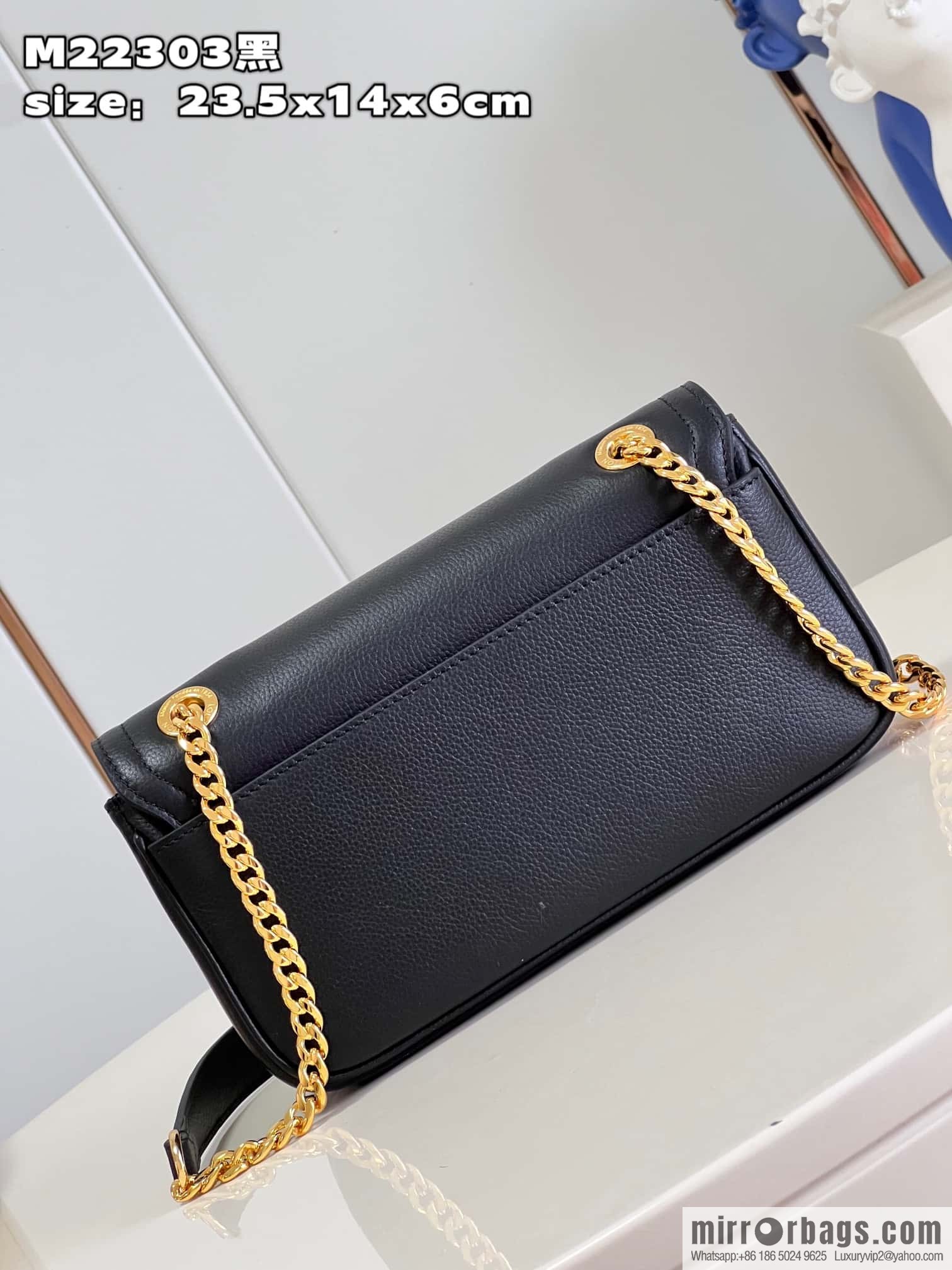 LV M22303 LOCKME EAST WEST chain bag