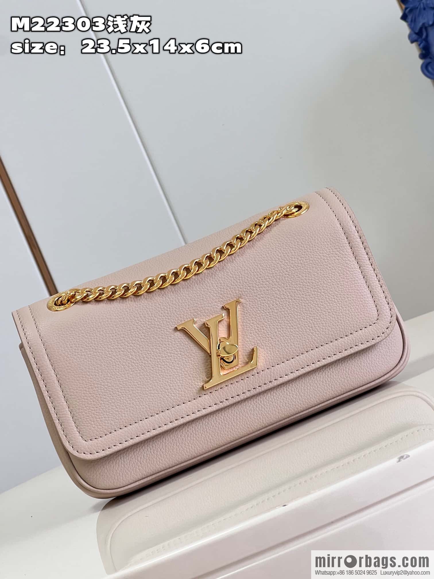 LV M22304 LOCKME EAST WEST chain bag
