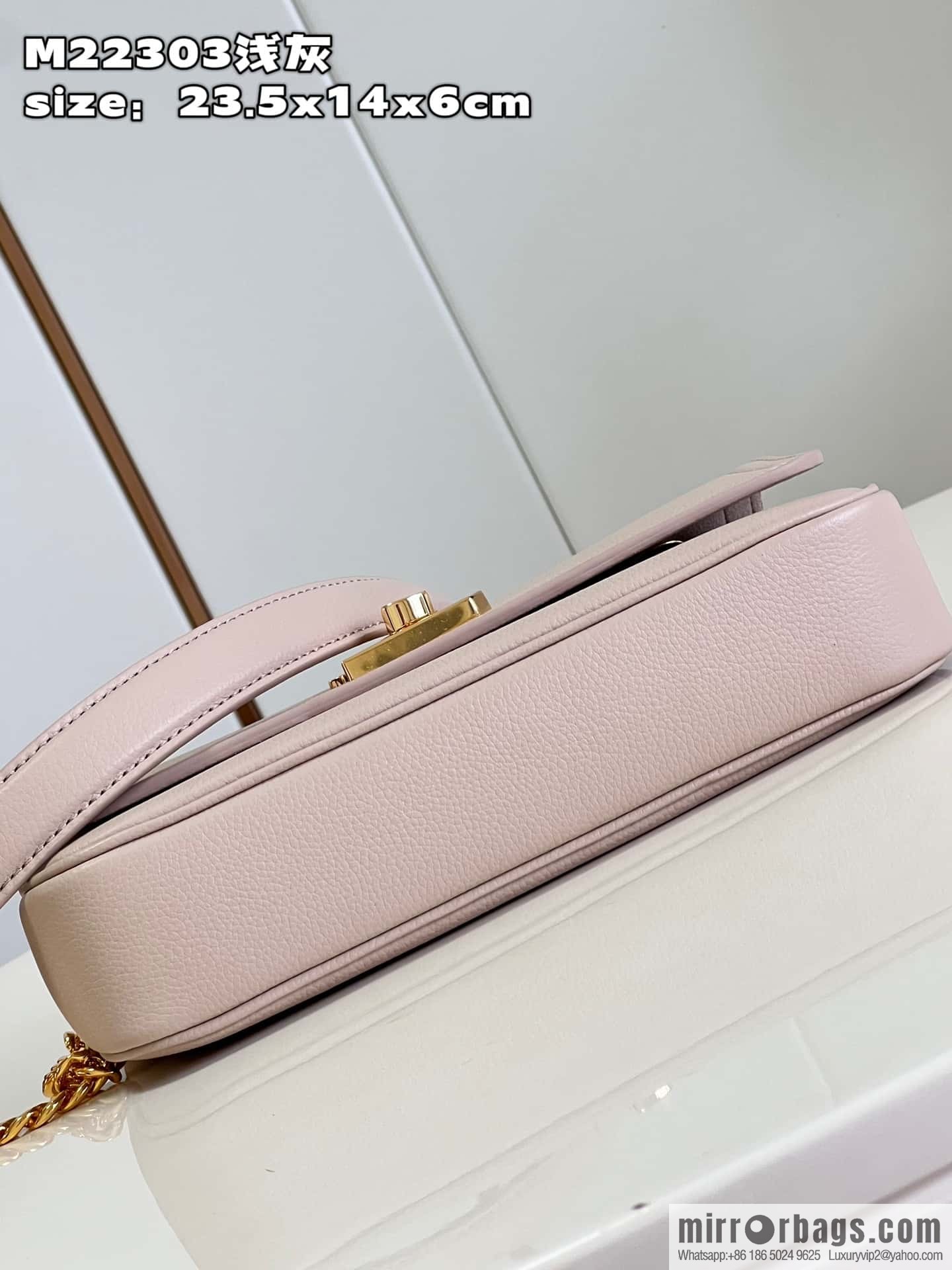 LV M22304 LOCKME EAST WEST chain bag
