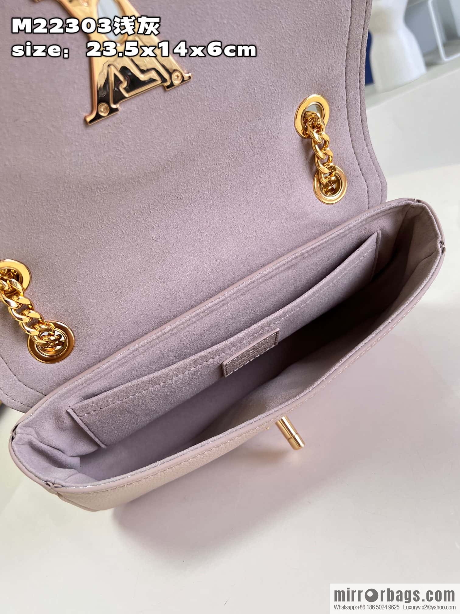 LV M22304 LOCKME EAST WEST chain bag