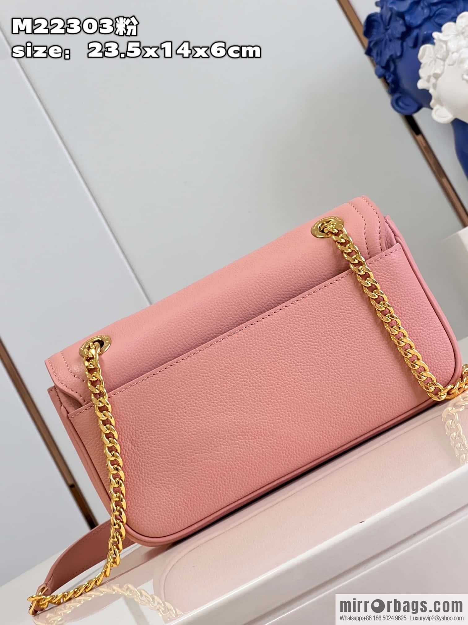 LV M22585 LOCKME EAST WEST chain bag