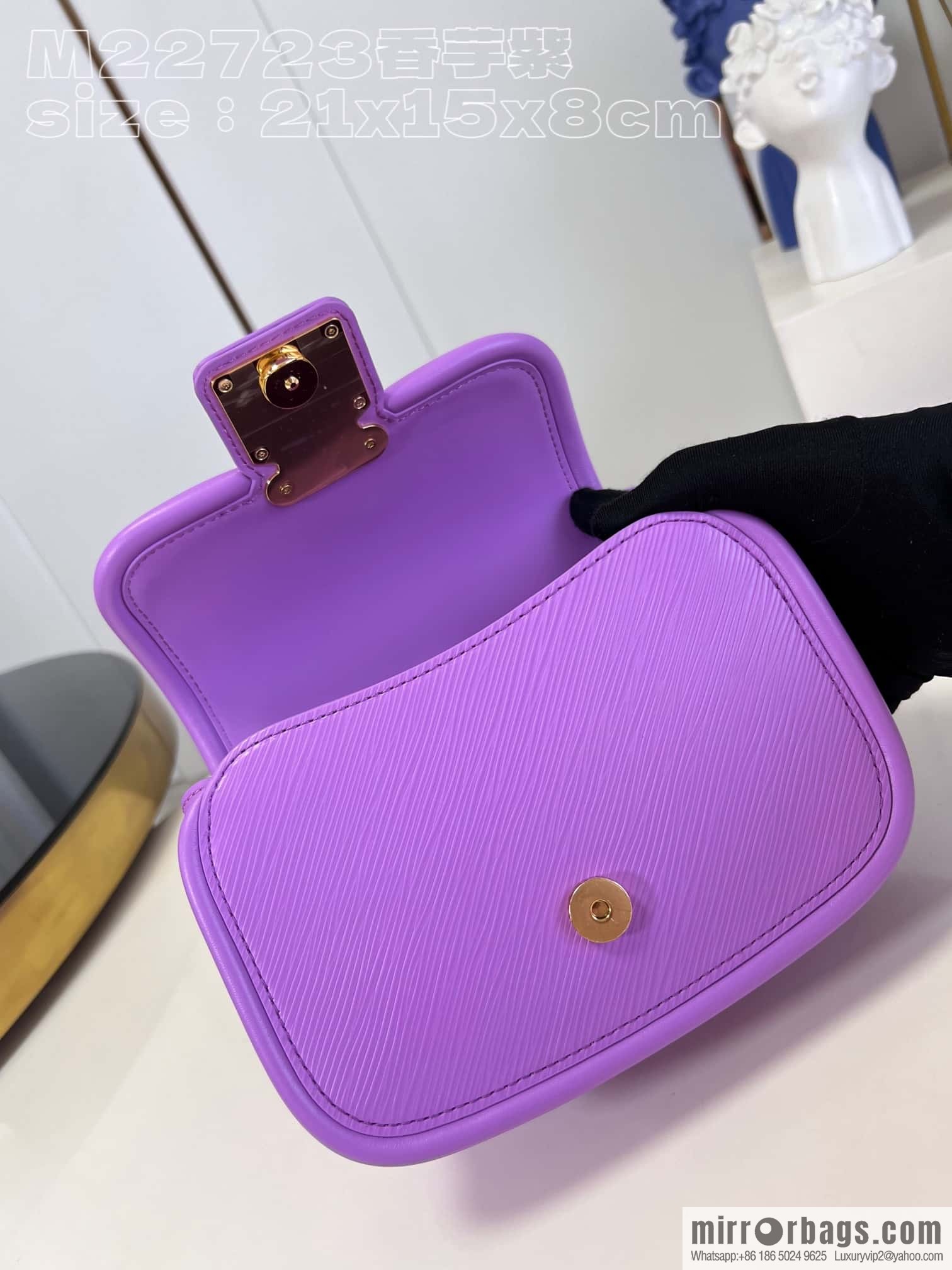 LV M22721 HIDE AND SEEK BAG