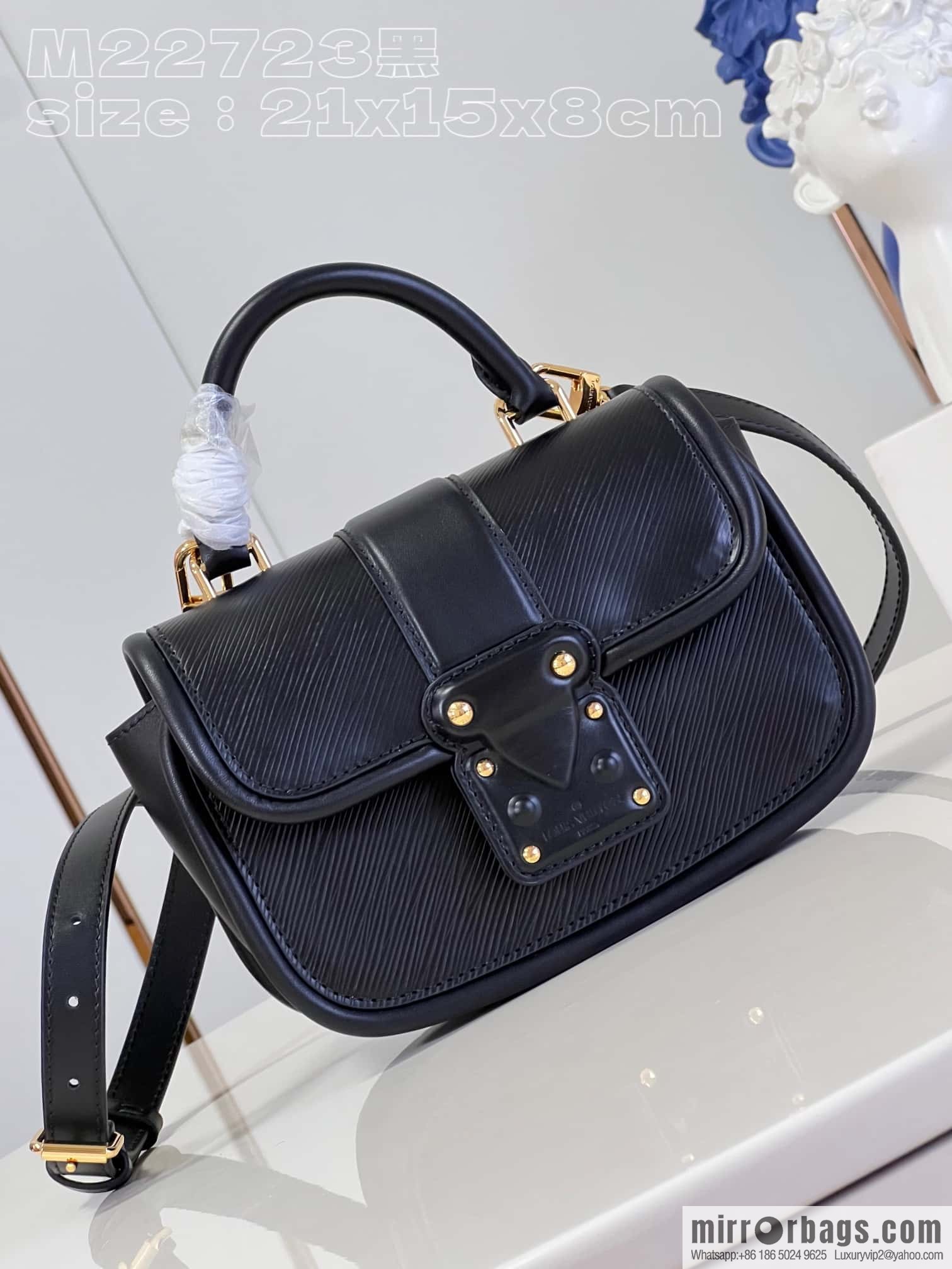 LV M22724 HIDE AND SEEK BAG