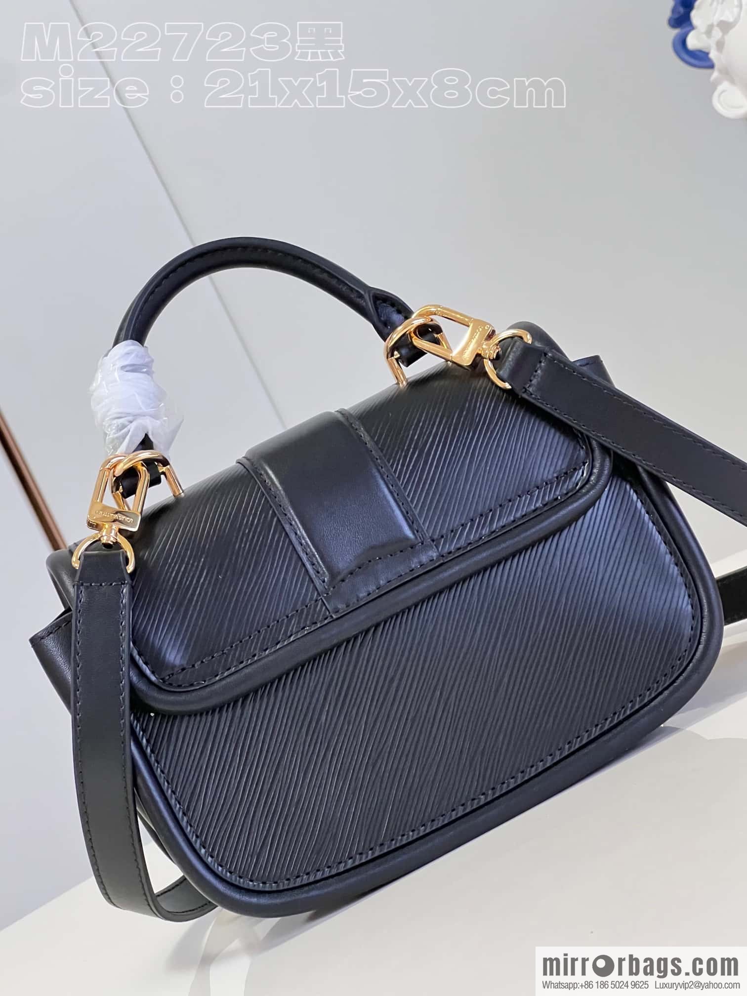 LV M22724 HIDE AND SEEK BAG