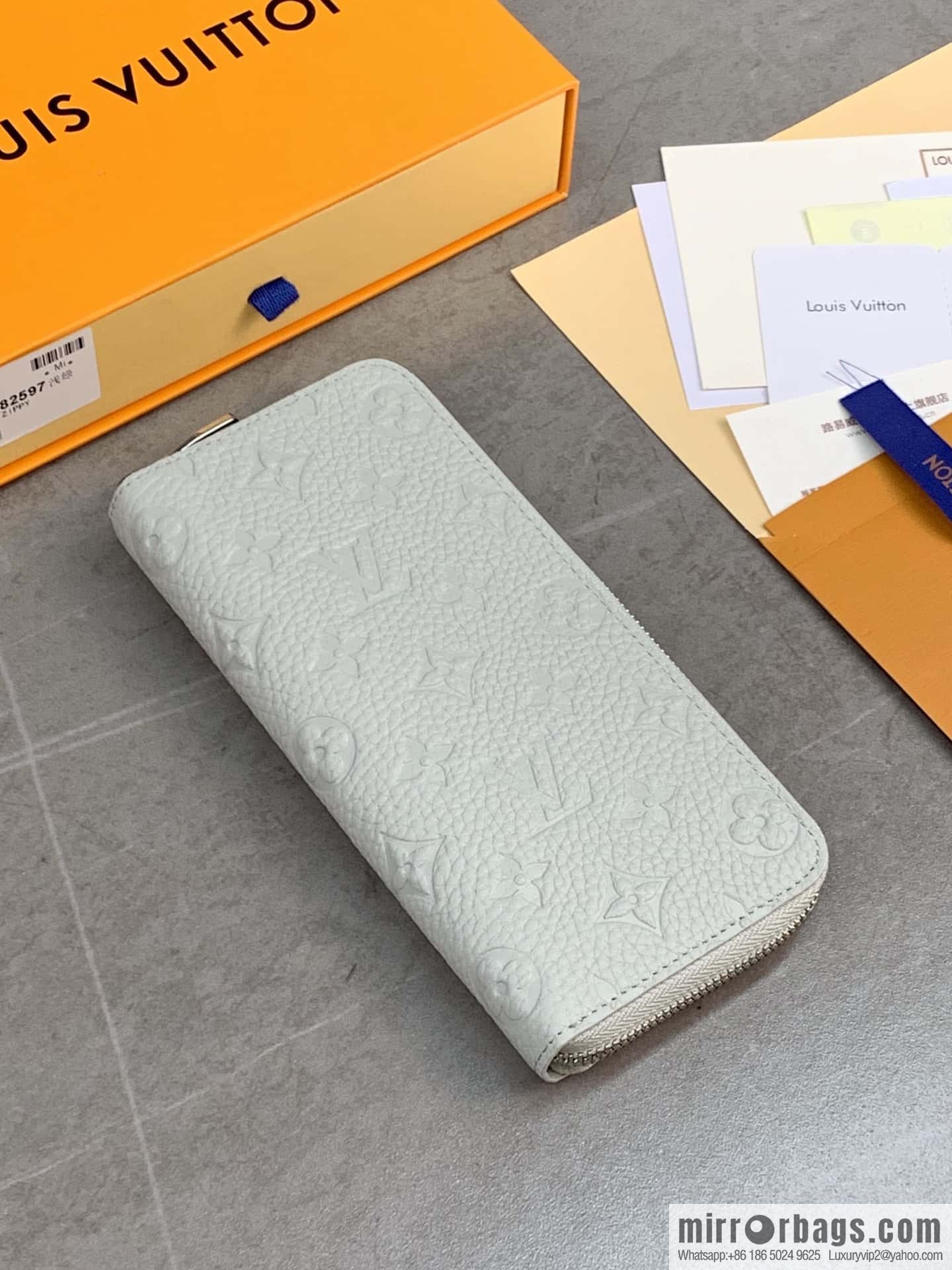 LV M82597 Zippy Vertical Wallet