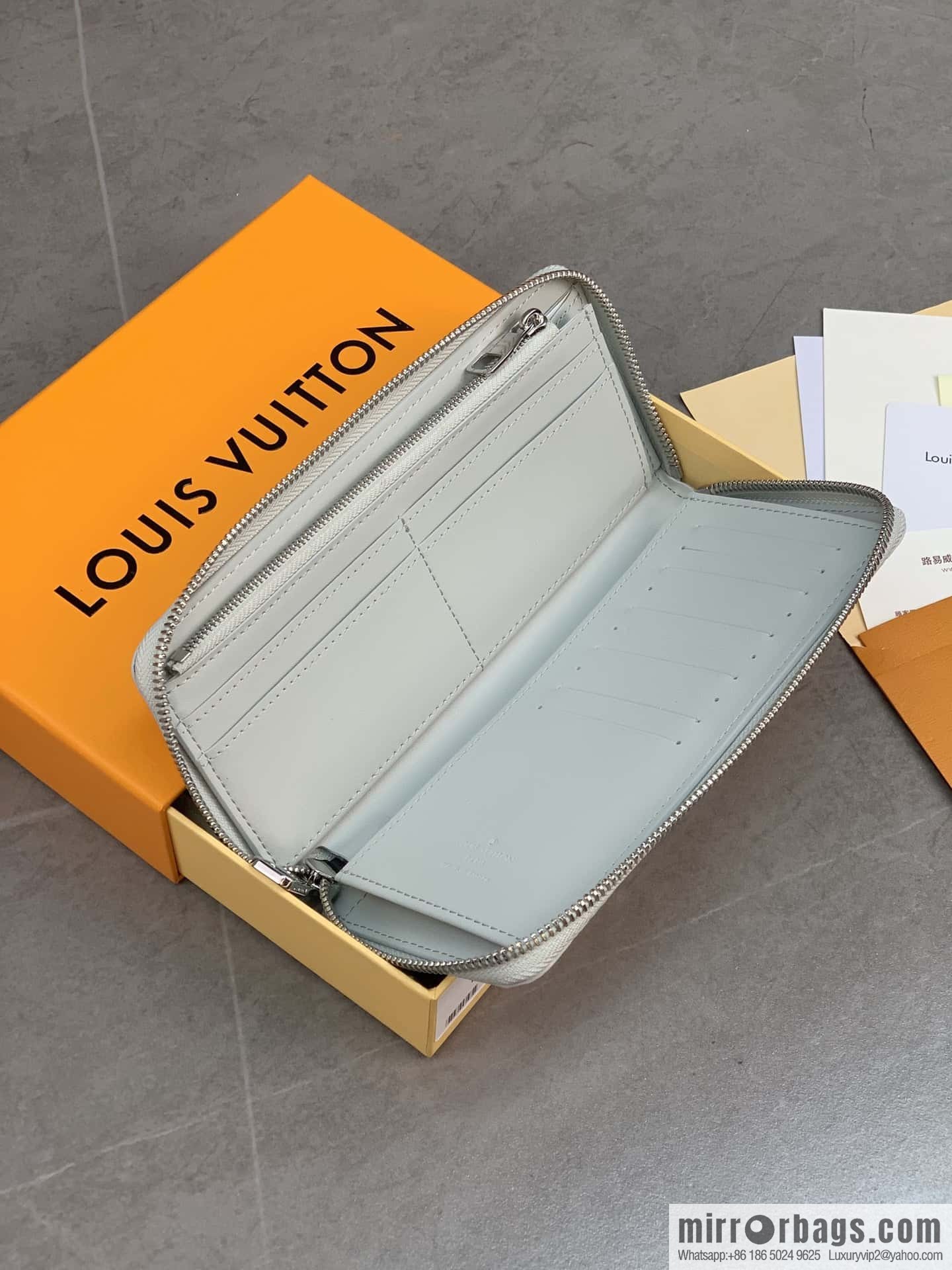 LV M82597 Zippy Vertical Wallet
