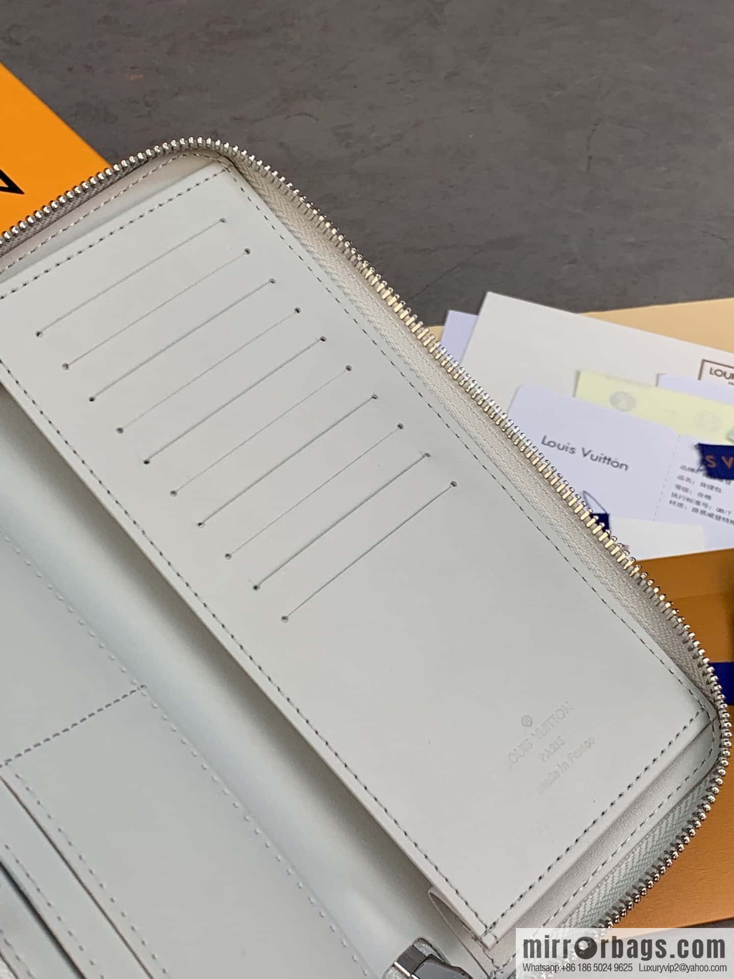 LV M82597 Zippy Vertical Wallet