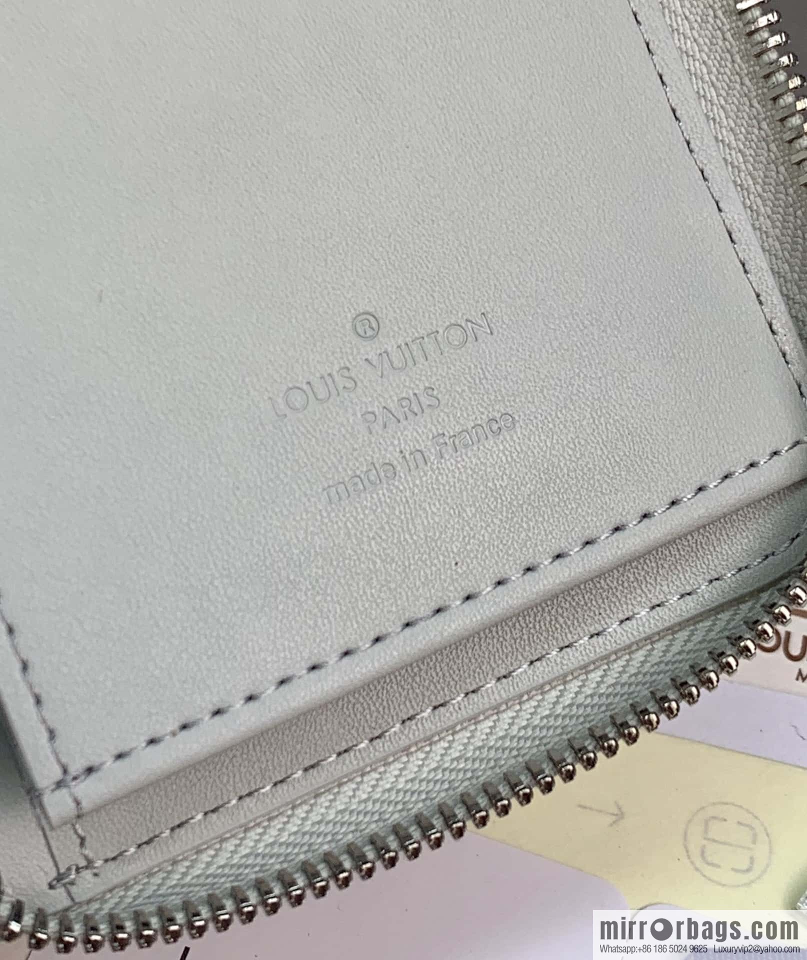 LV M82597 Zippy Vertical Wallet