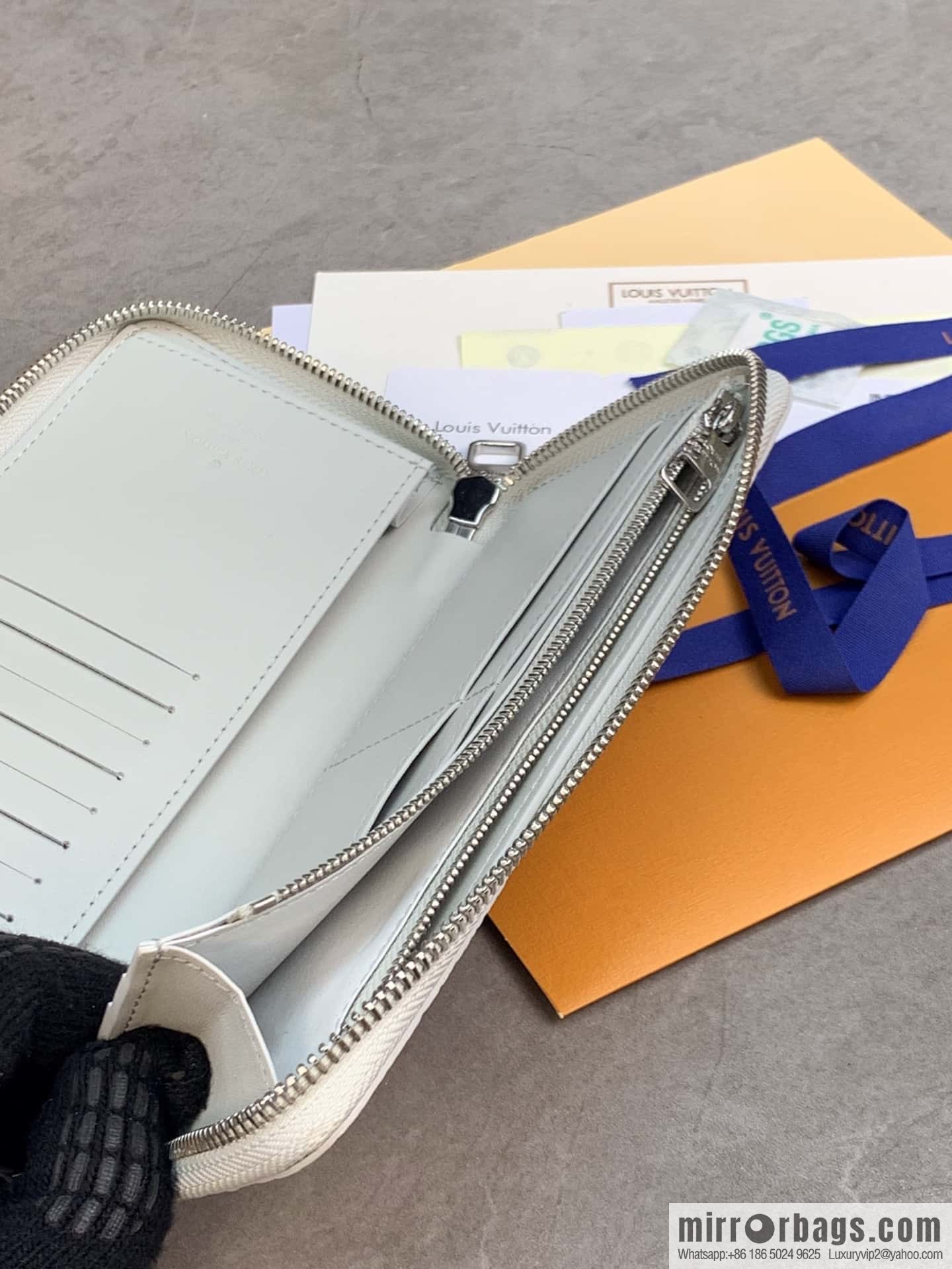 LV M82597 Zippy Vertical Wallet