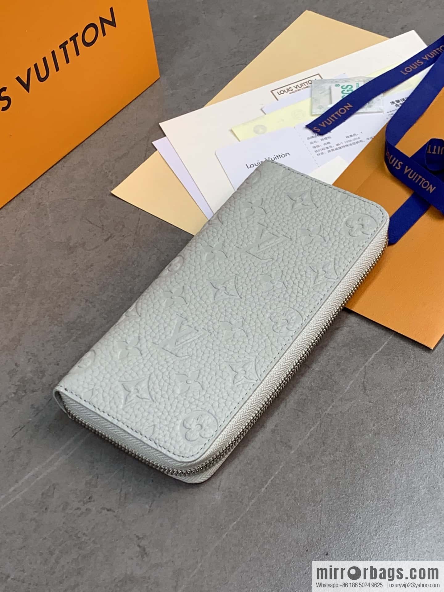LV M82597 Zippy Vertical Wallet
