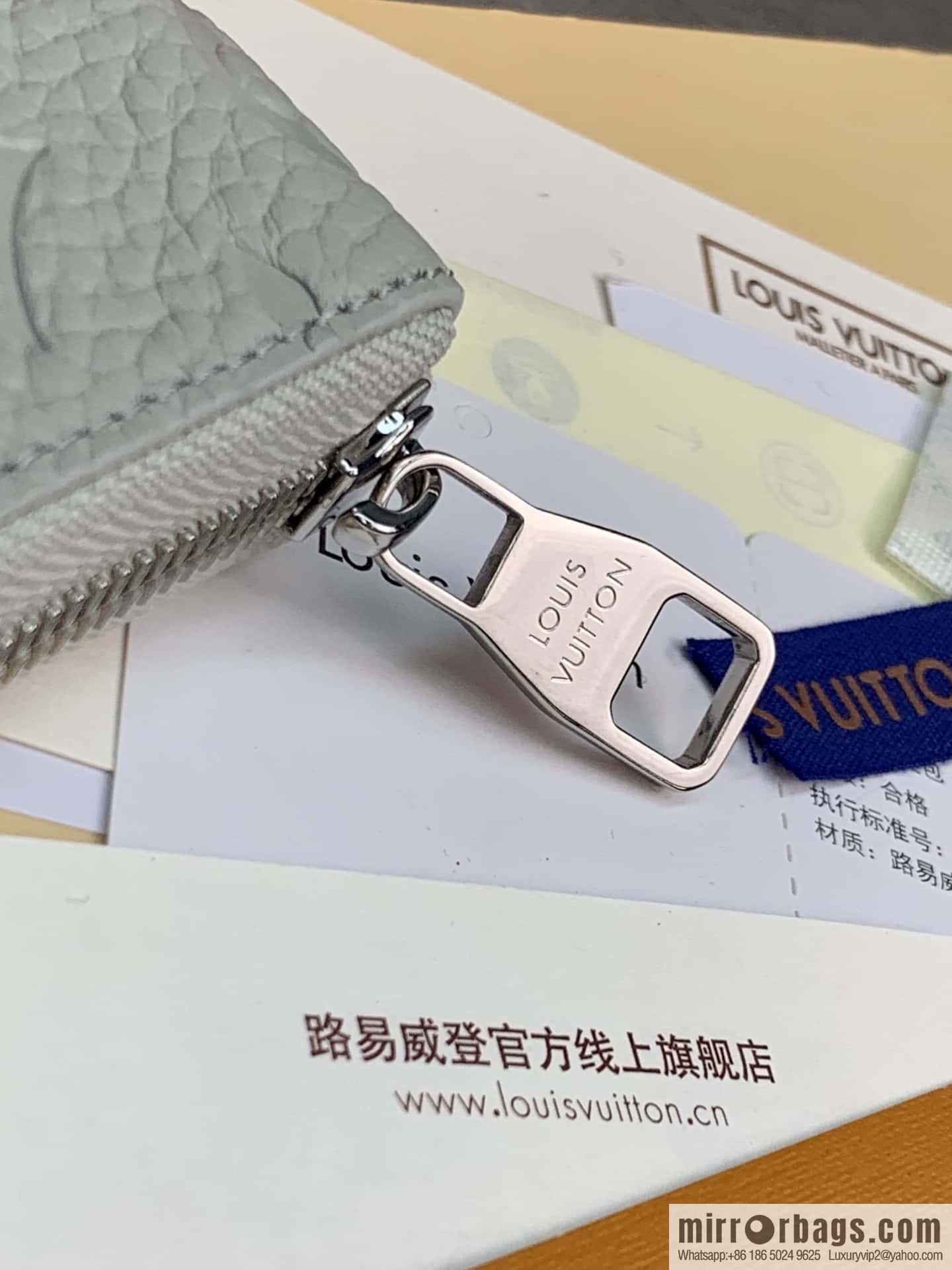 LV M82597 Zippy Vertical Wallet