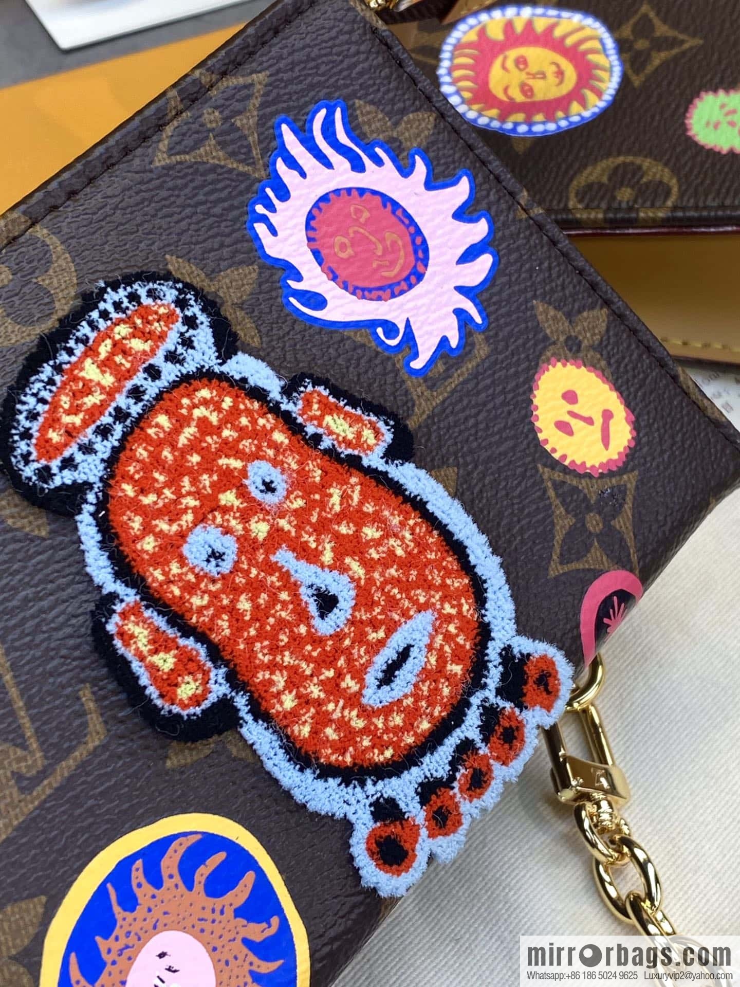 M81982 LV x YK Toiletry Pouch On Chain