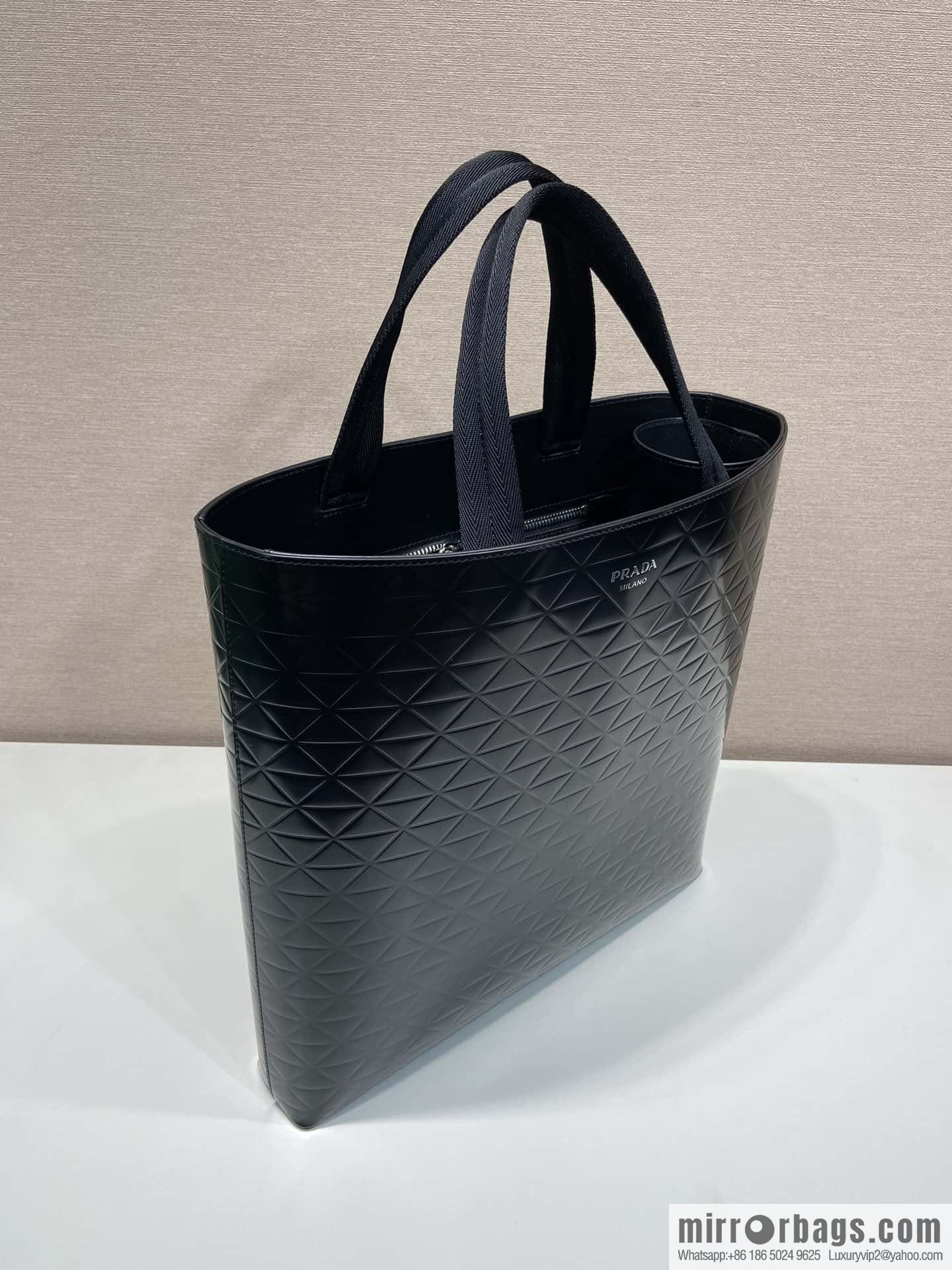 PRADA vertical embossed tote bag 2VG113