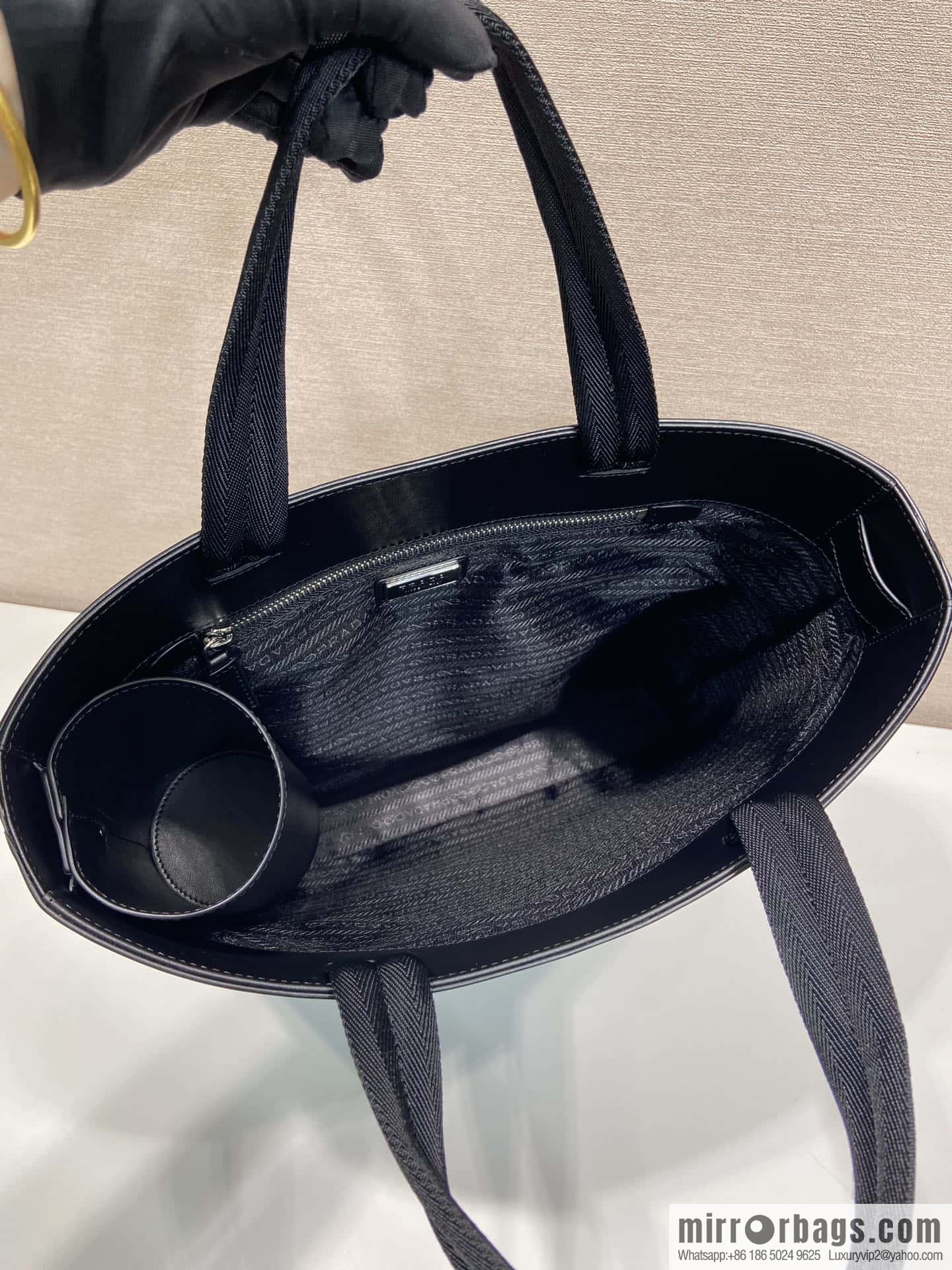 PRADA vertical embossed tote bag 2VG113