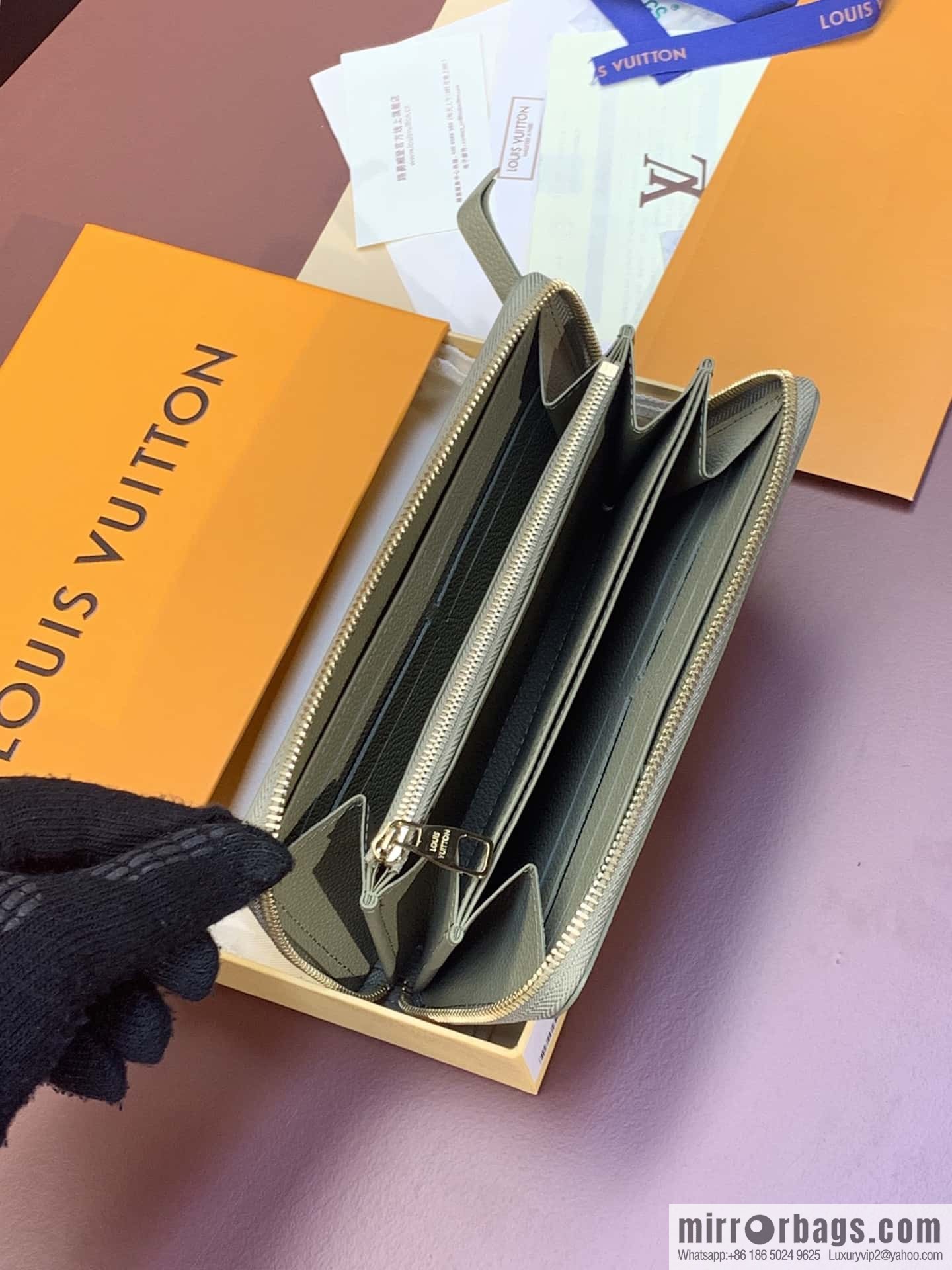 LV M69794 Zippy Wallet