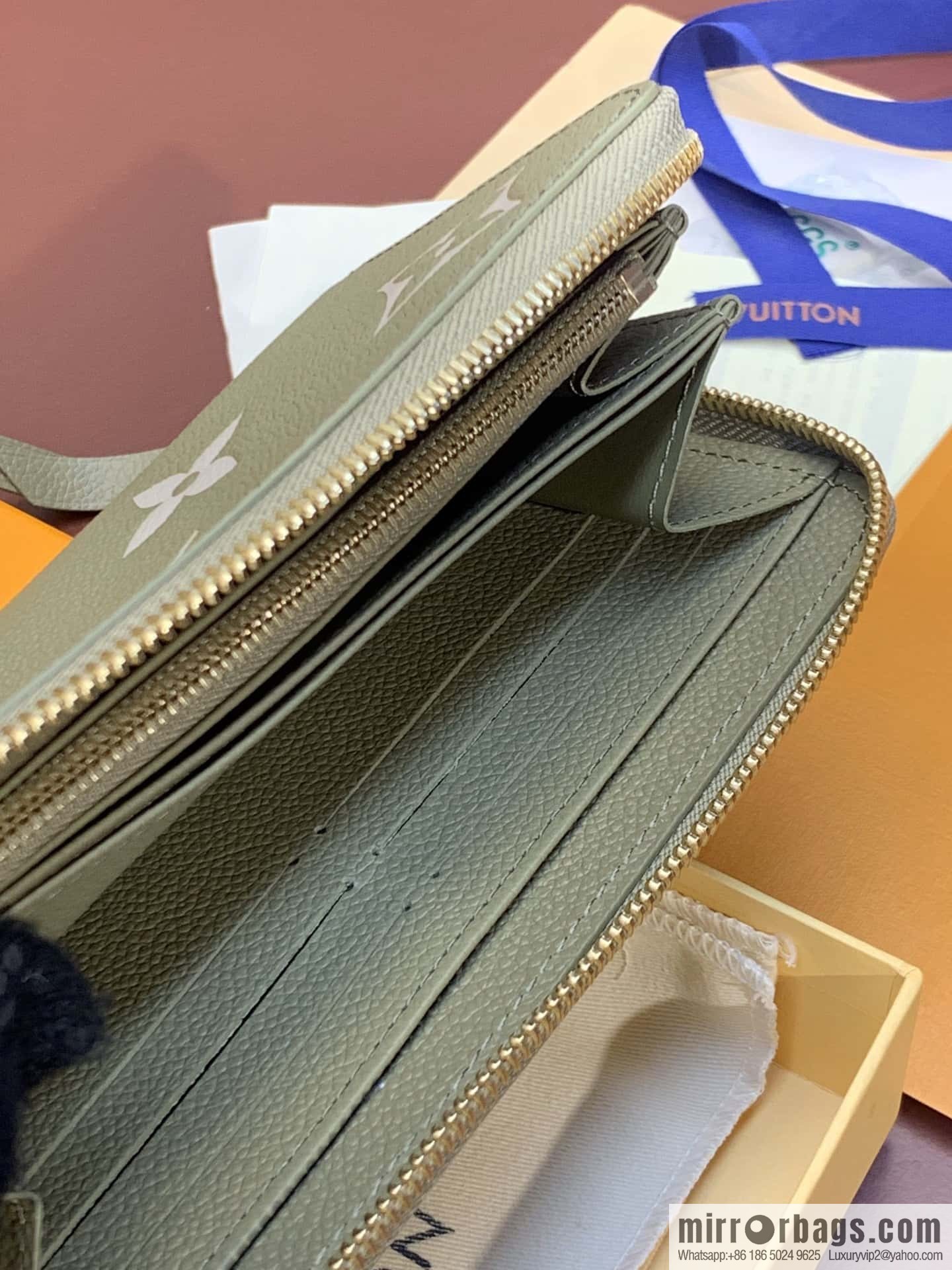 LV M69794 Zippy Wallet