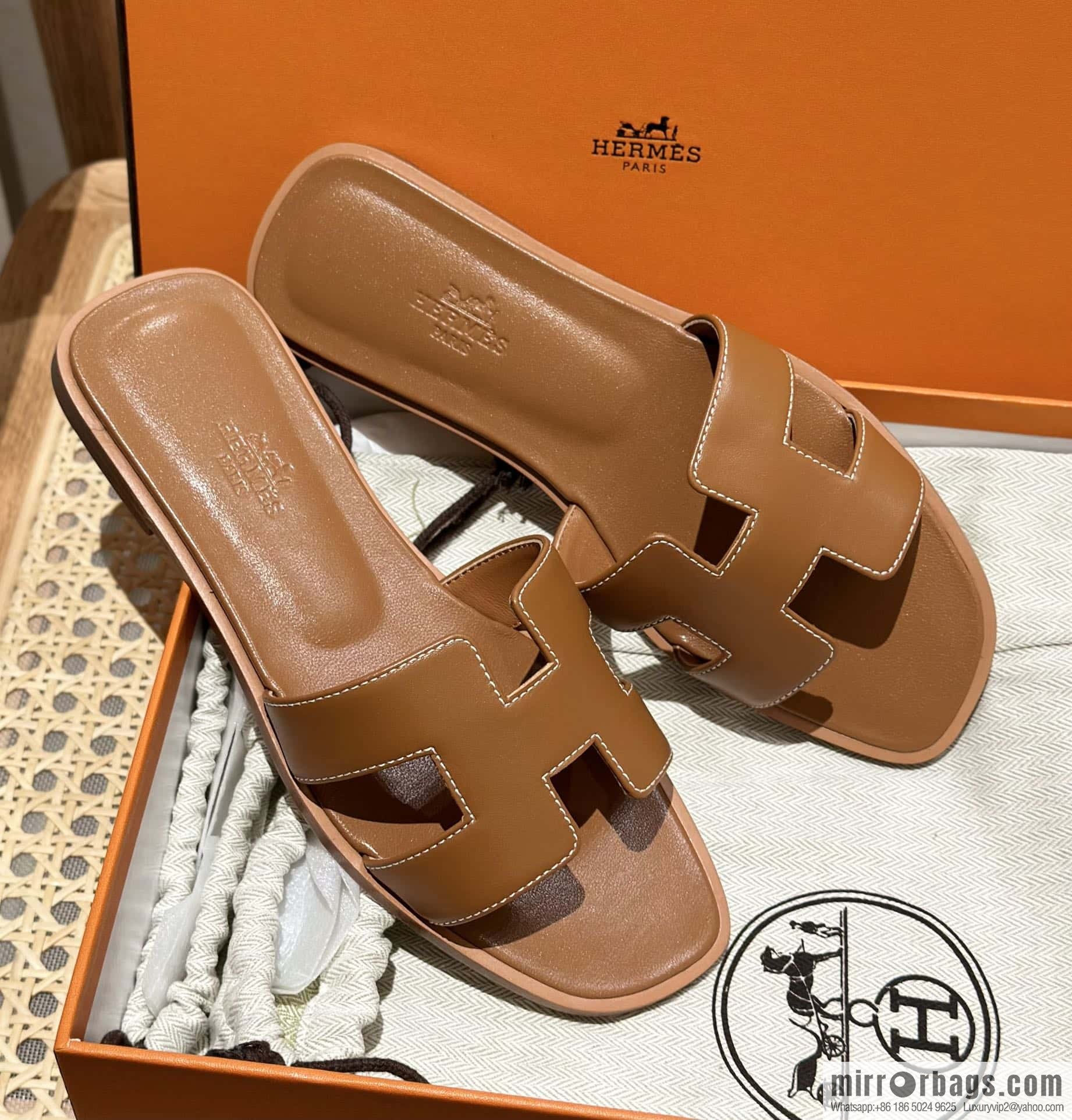 Hermès leather outsole H slippers, brown