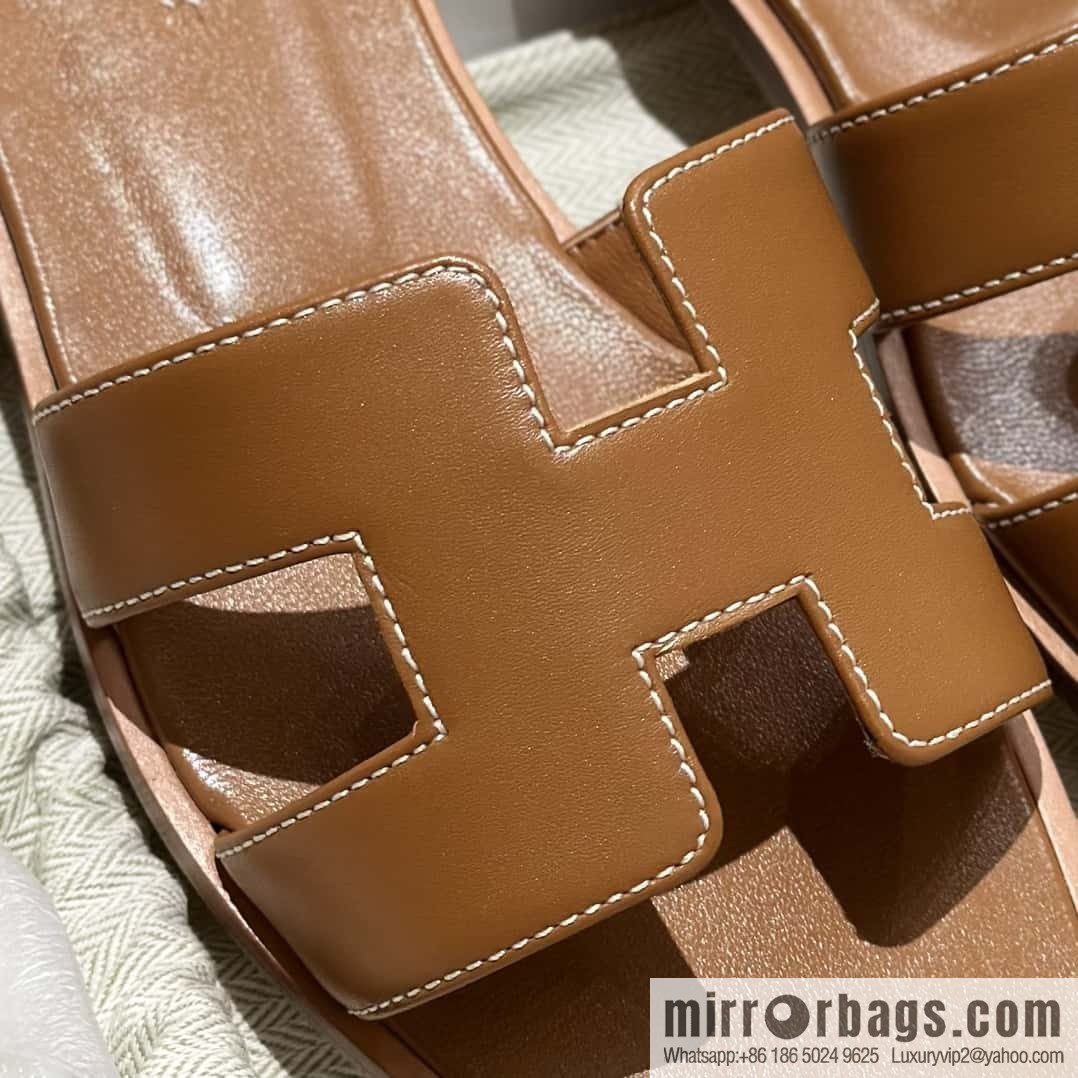 Hermès leather outsole H slippers, brown