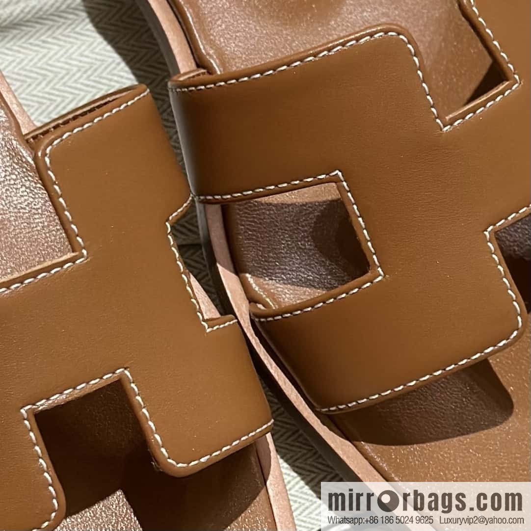 Hermès leather outsole H slippers, brown