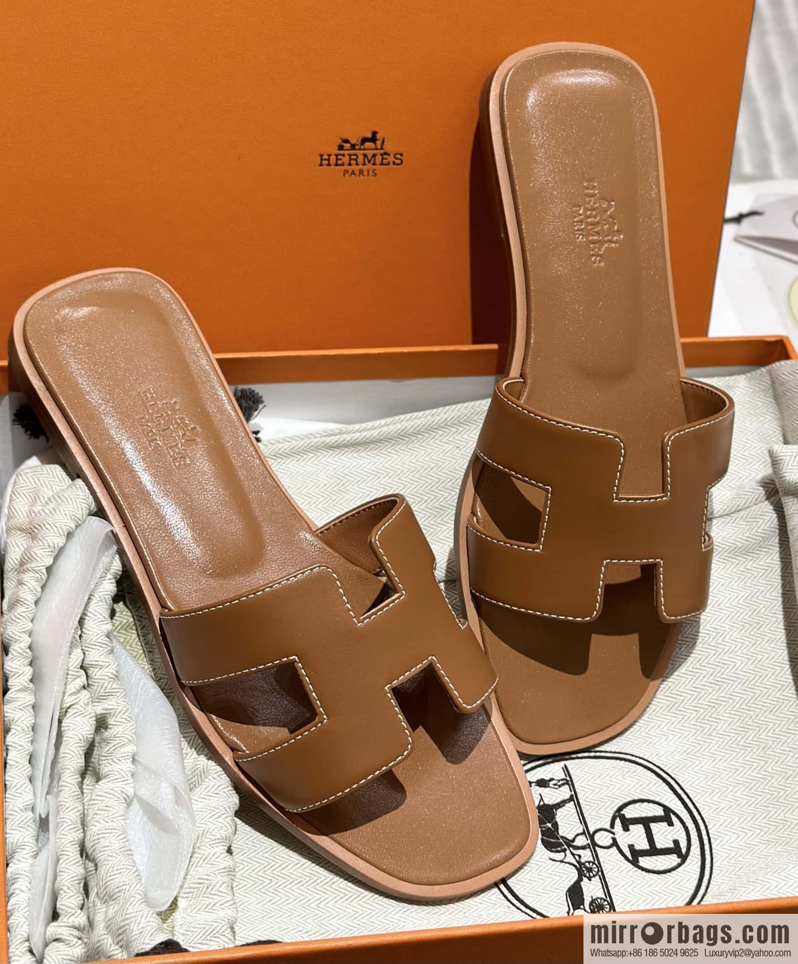 Hermès leather outsole H slippers, brown