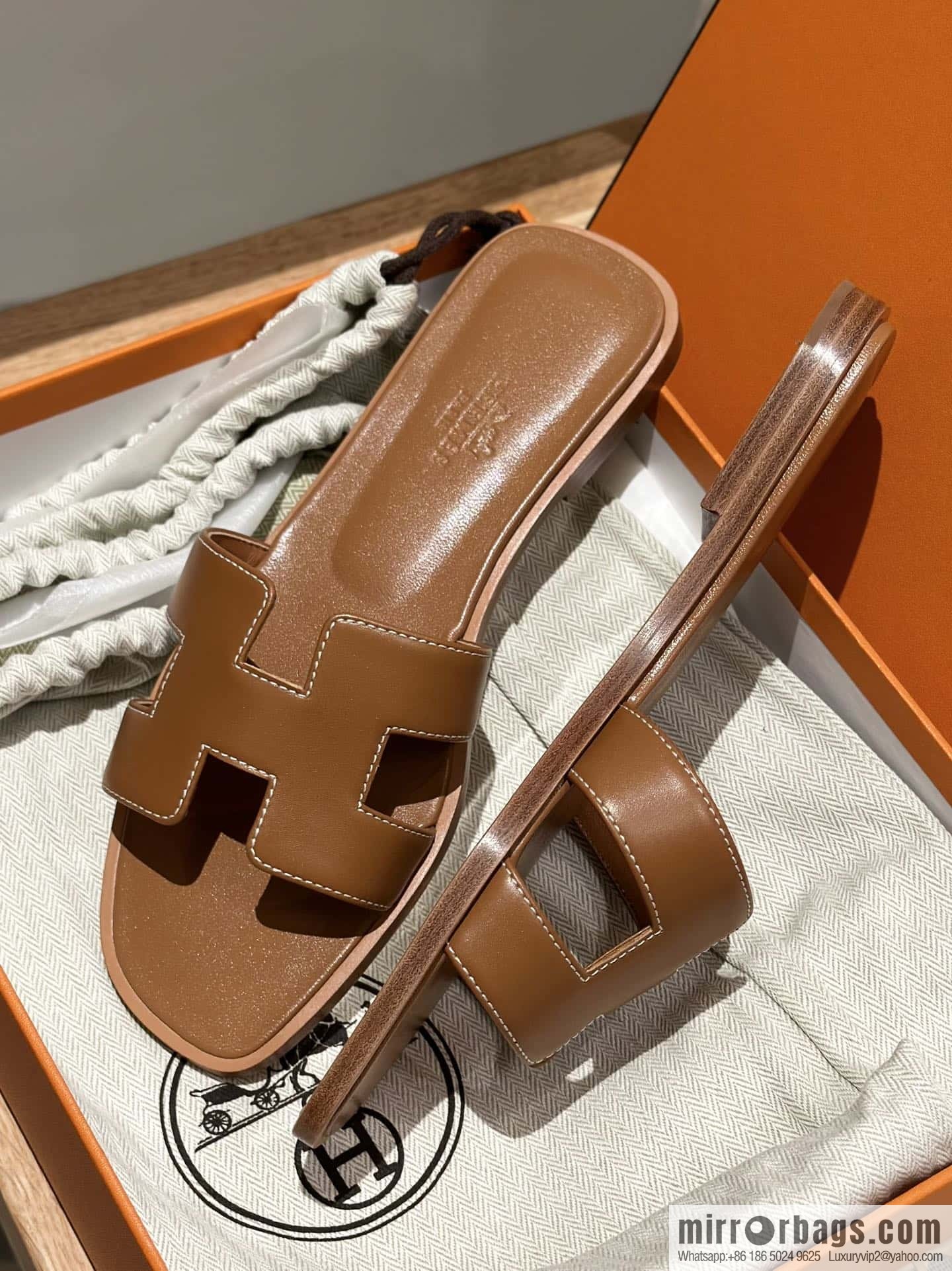 Hermès leather outsole H slippers, brown