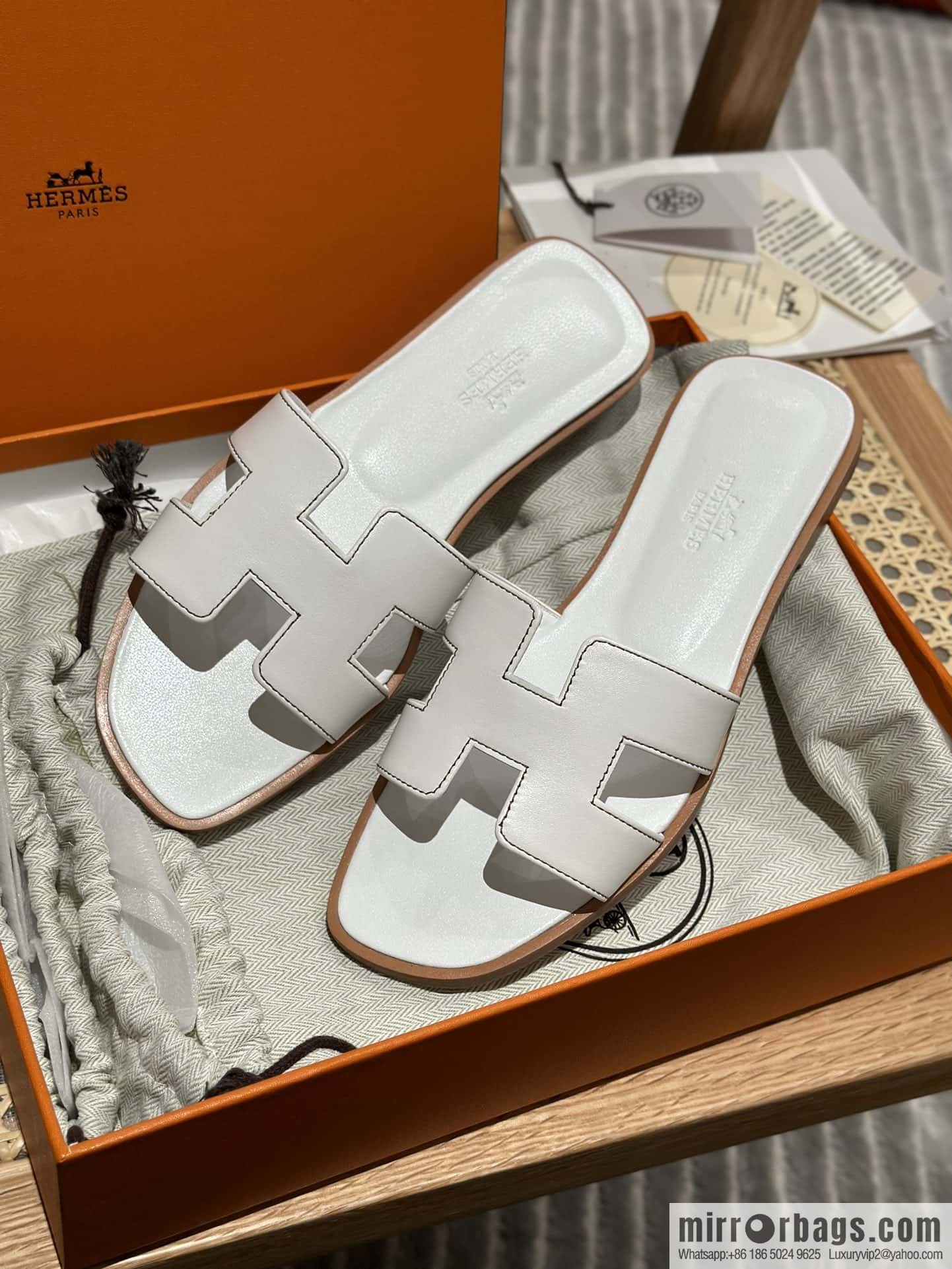 Hermès leather outsole H slippers, white