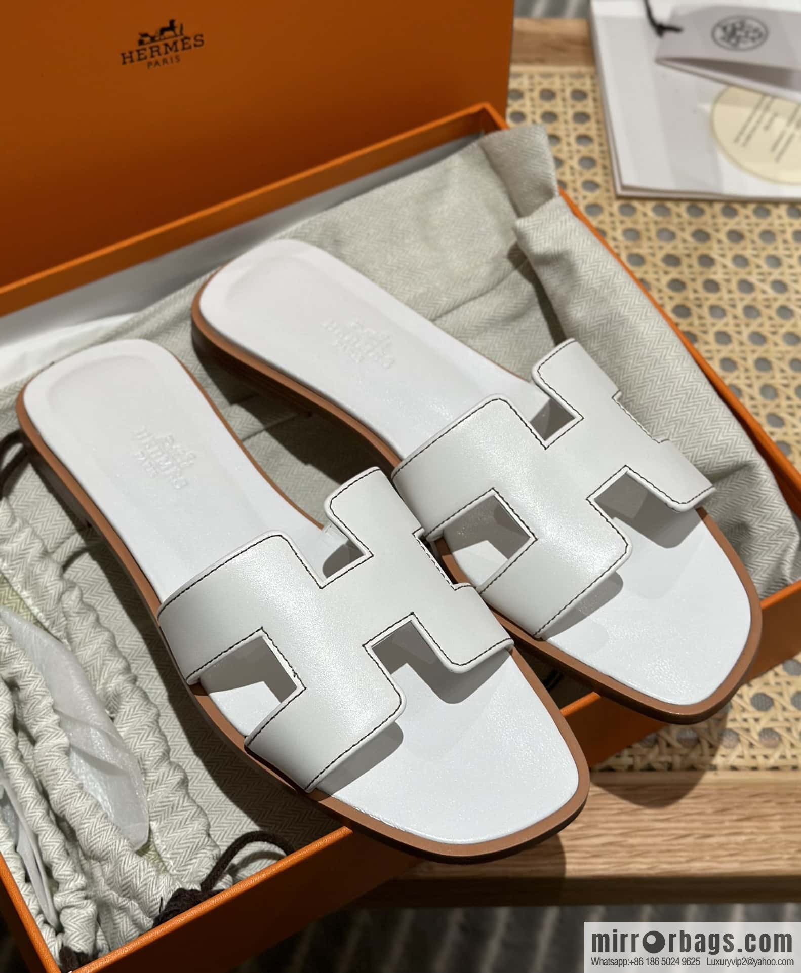 Hermès leather outsole H slippers, white