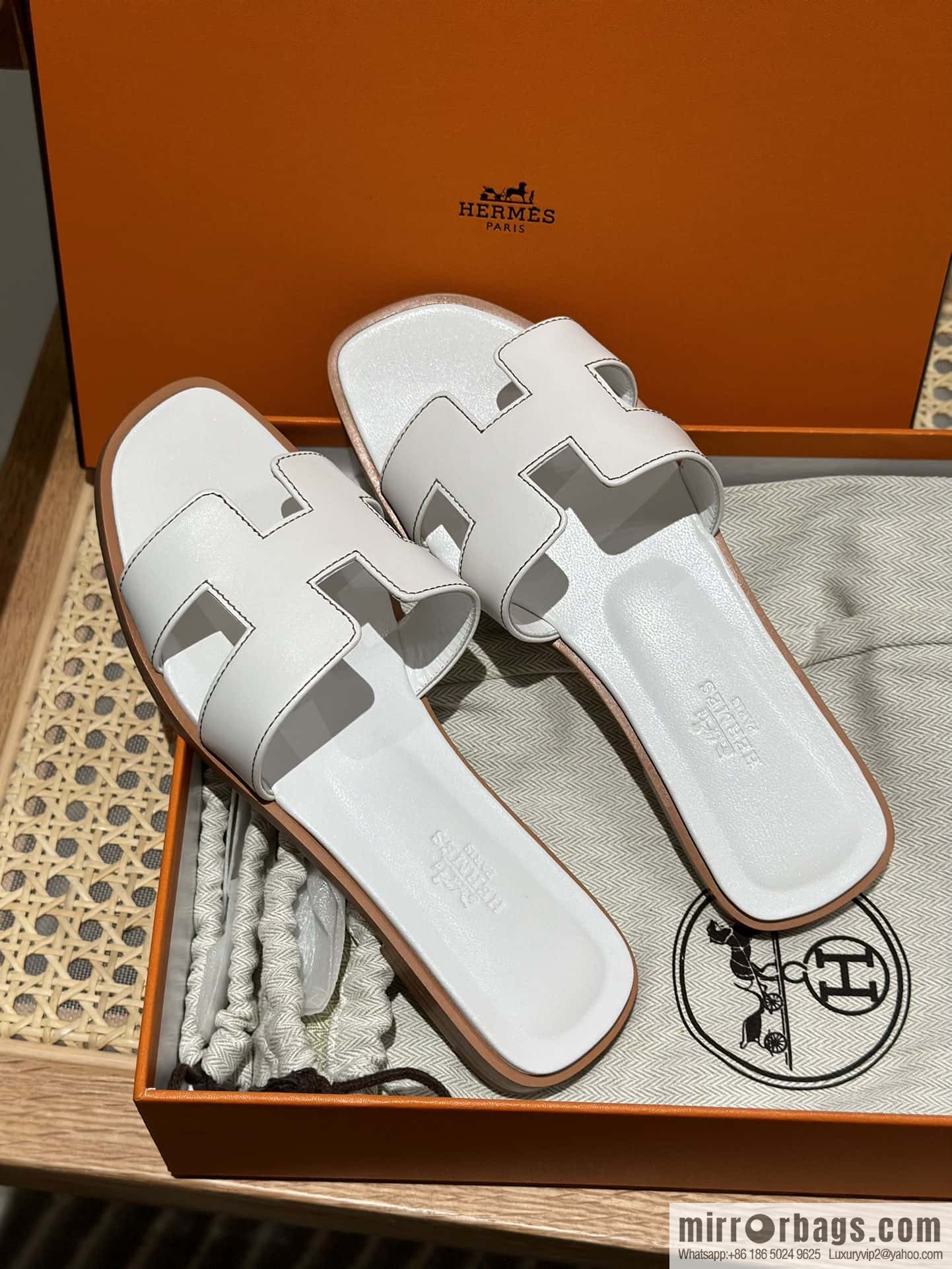 Hermès leather outsole H slippers, white
