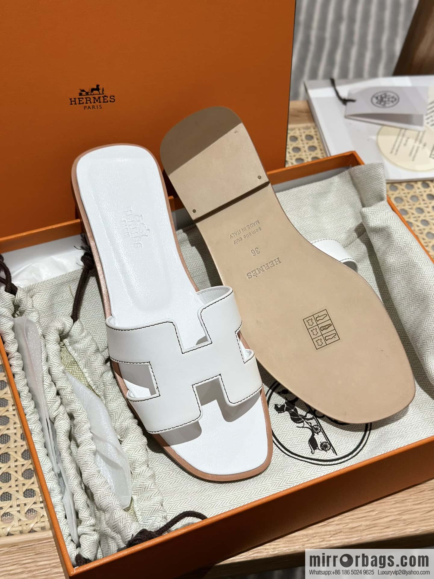 Hermès leather outsole H slippers, white