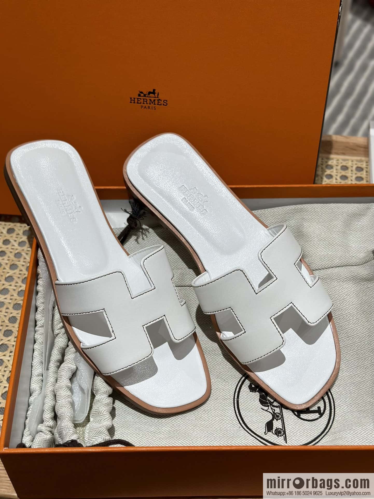 Hermès leather outsole H slippers, white