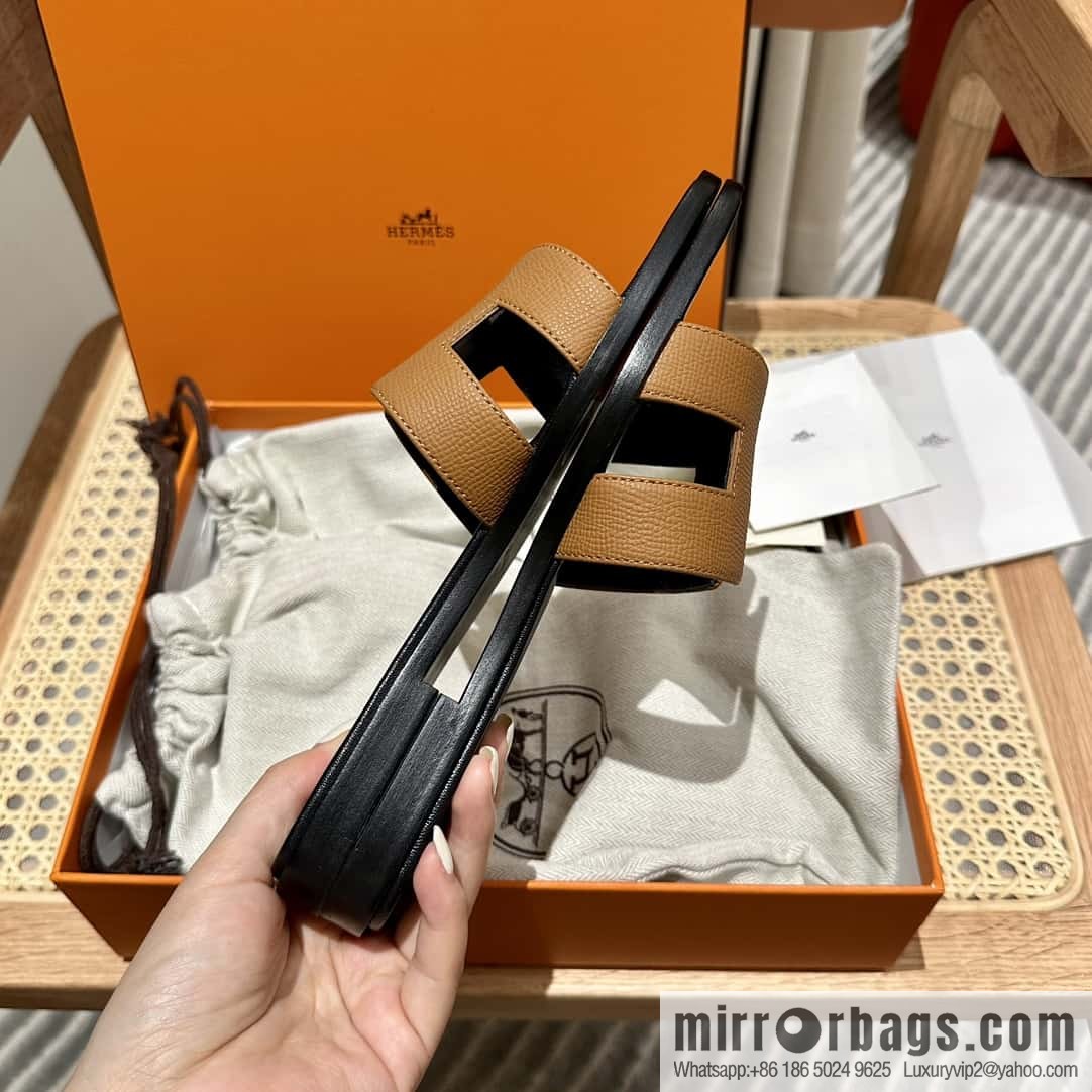 Hermès leather outsole H slippers, black and brown.