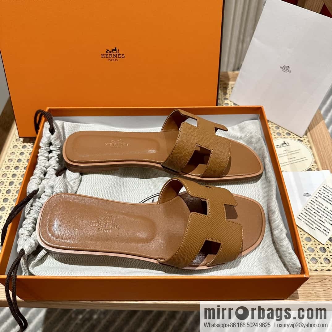 Hermès leather outsole H slippers, brown