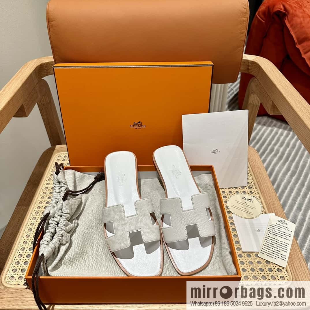 Hermès leather outsole H slippers, white