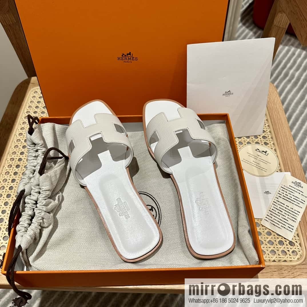Hermès leather outsole H slippers, white