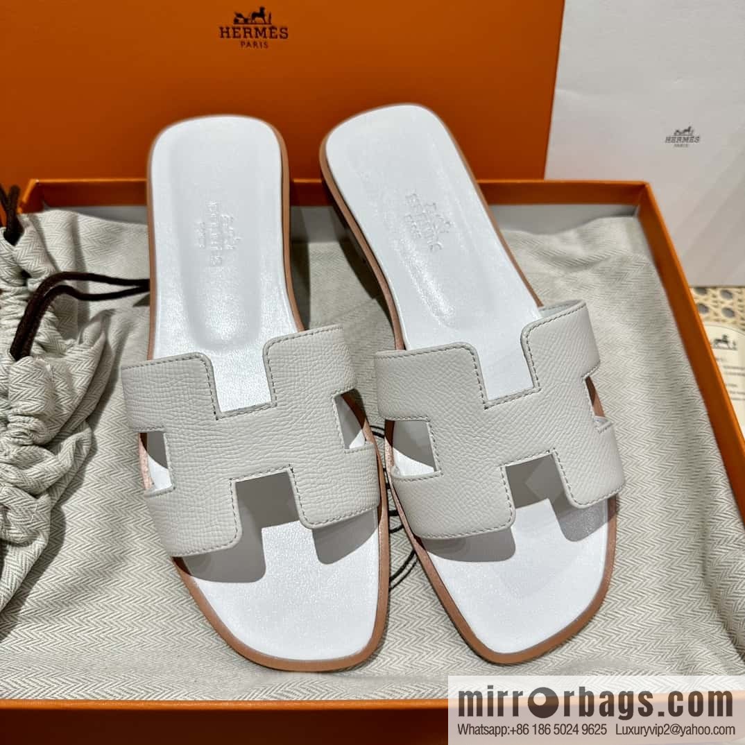 Hermès leather outsole H slippers, white