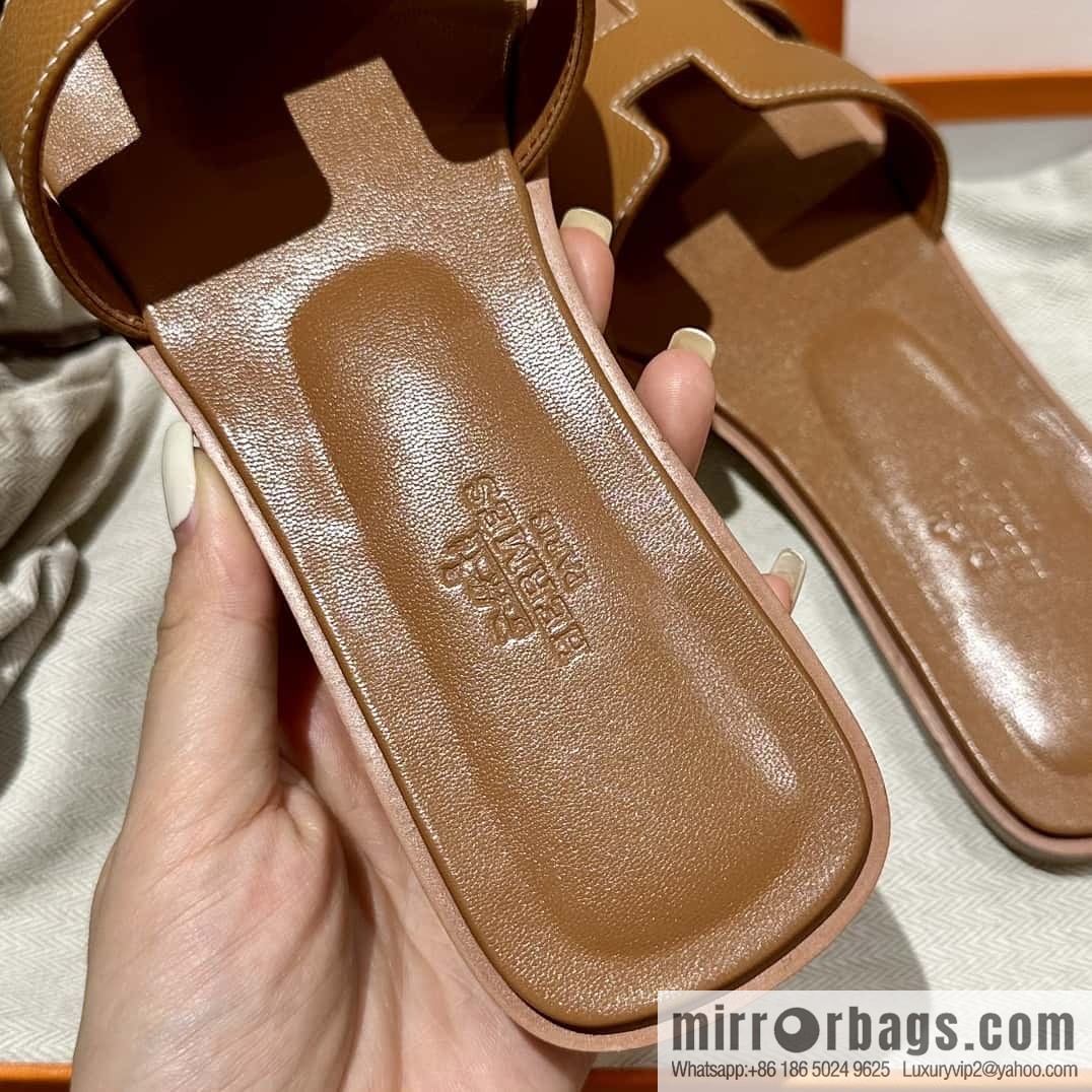 Hermès leather outsole H slippers, brown