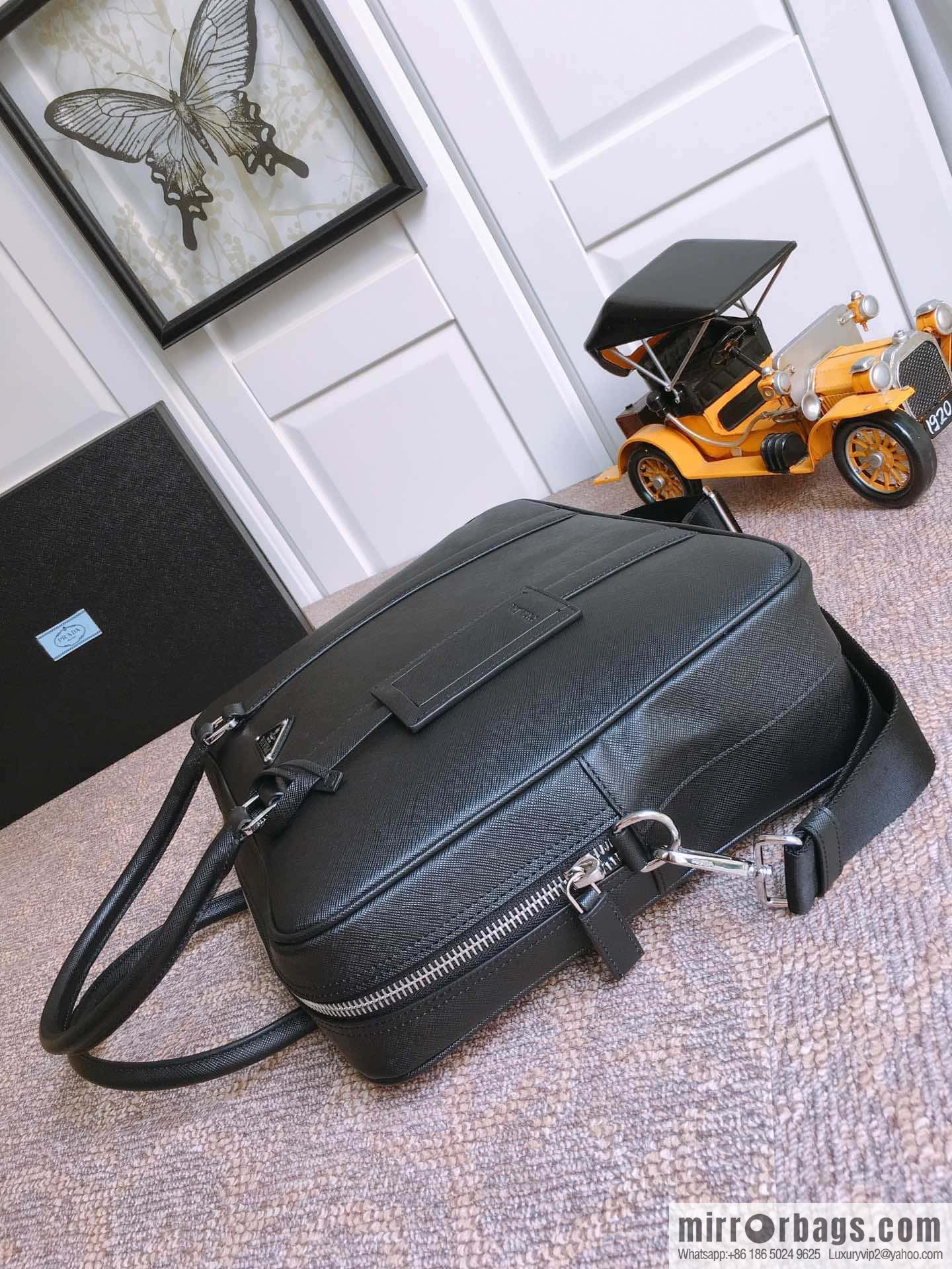 PRADA imported cross pattern leather briefcase 0661