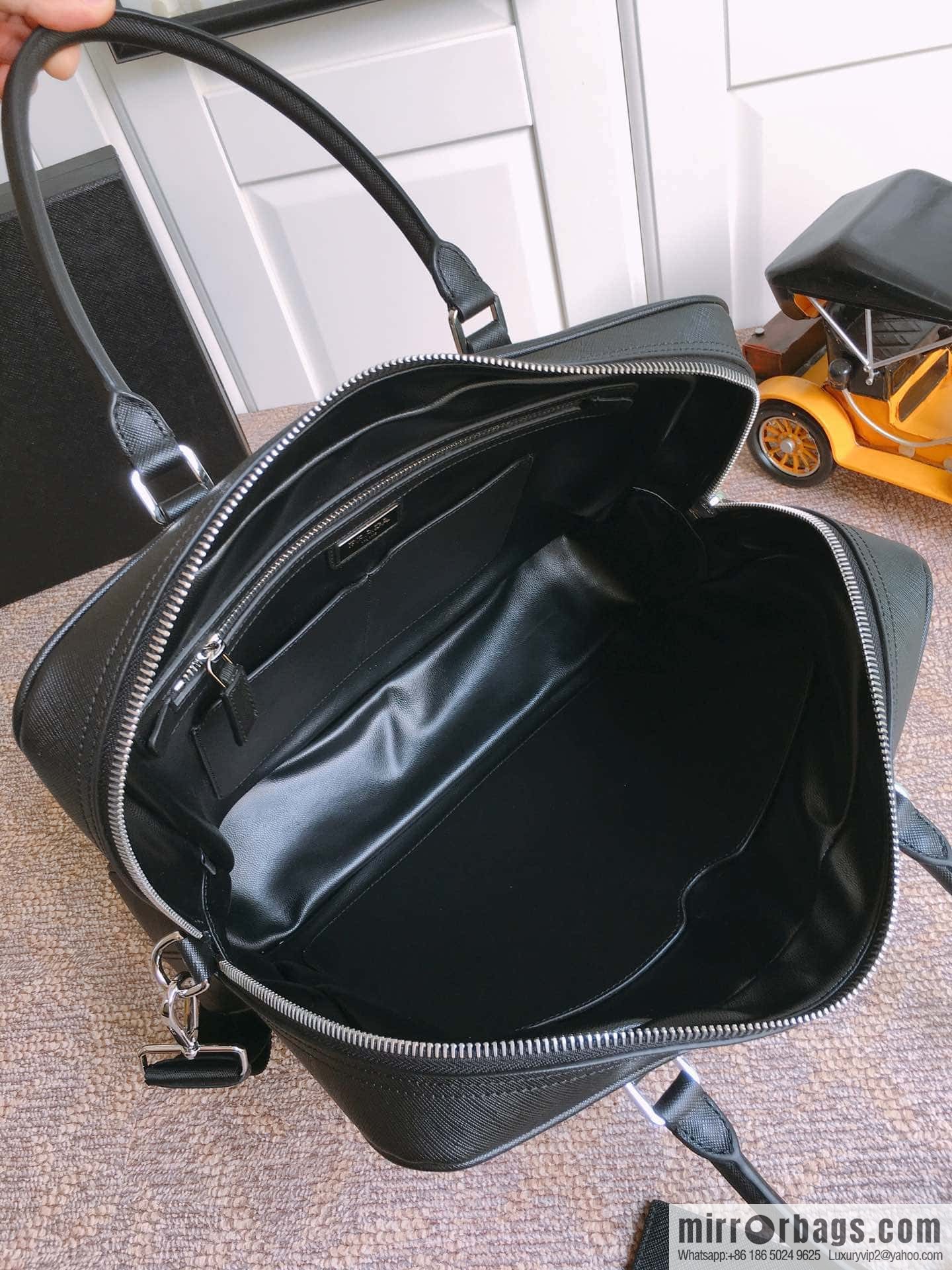 PRADA imported cross pattern leather briefcase 0661