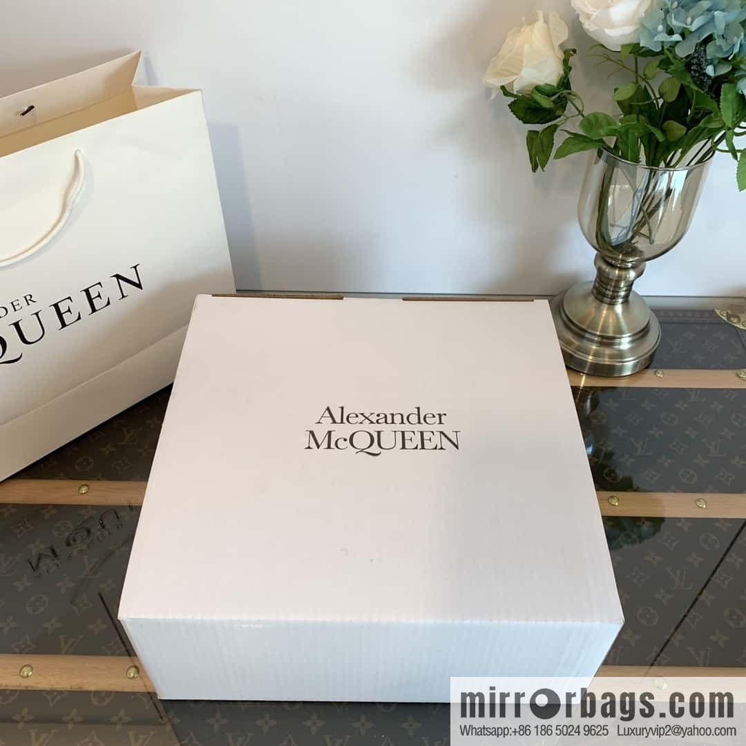 Alexander McQueen, platform black calfskin Chelsea booties