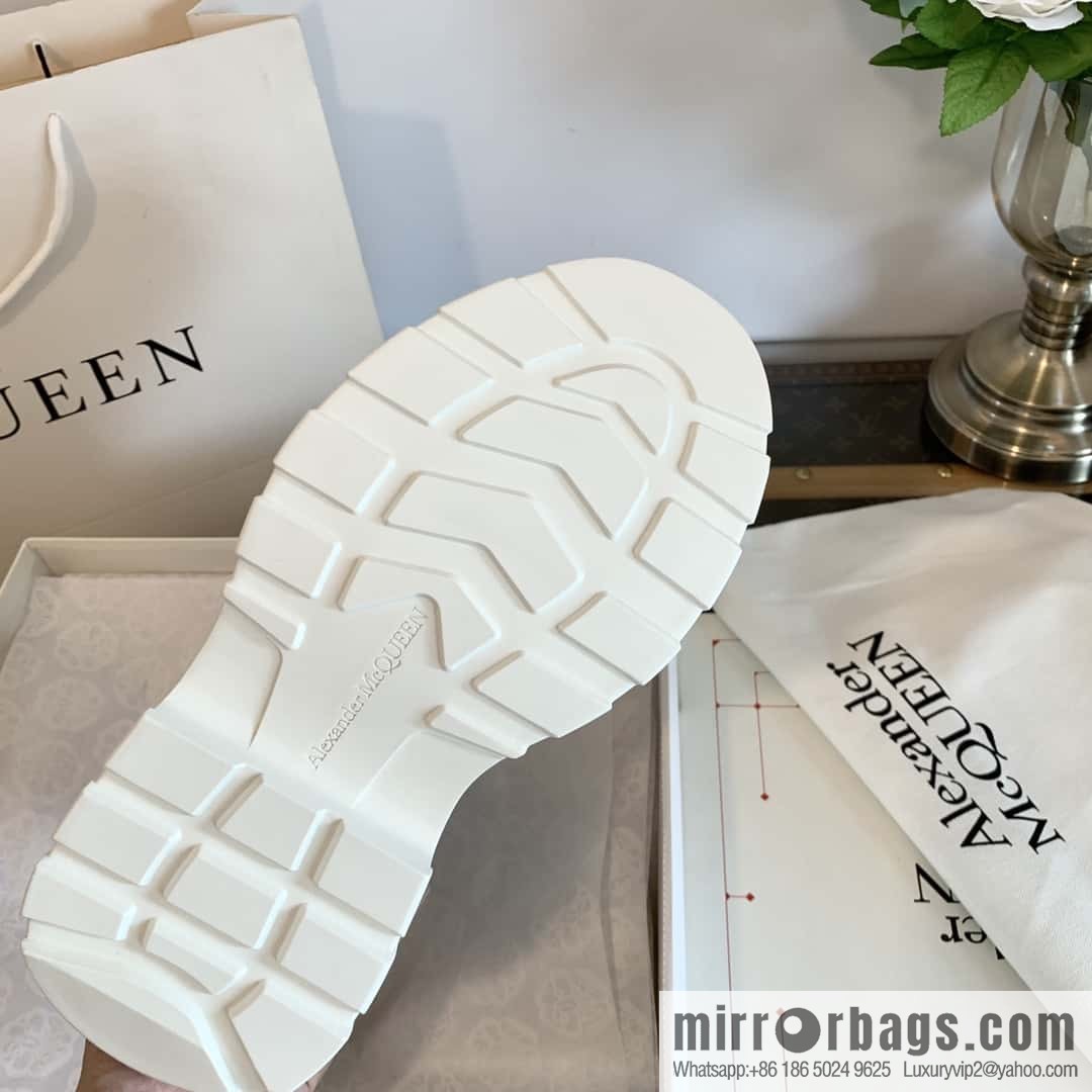 Alexander McQueen, platform black and white Chelsea booties