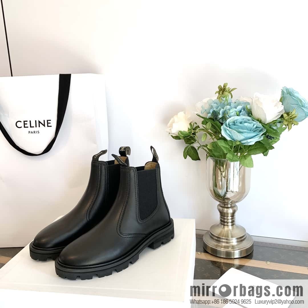 CELINE Celin in one pair of Chelsea booties