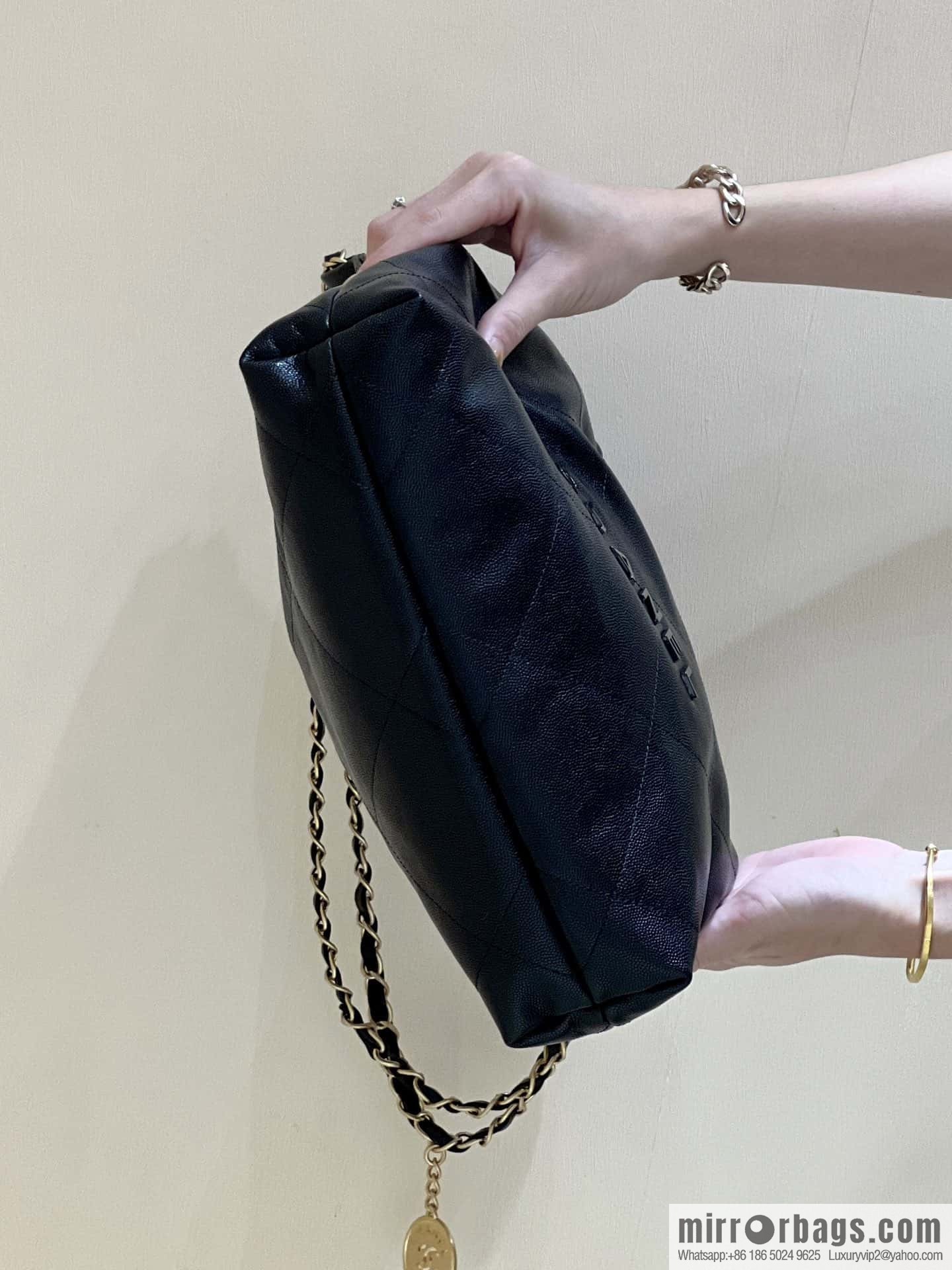 CHANEL black caviar leather with gun color hardware 23k garbage bag, small AS3260